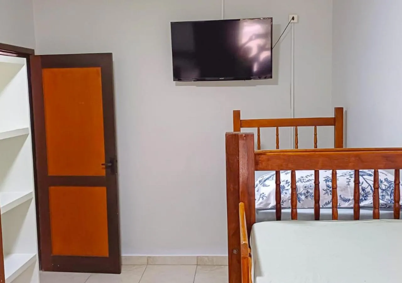 Bed in Pousada Nereidas