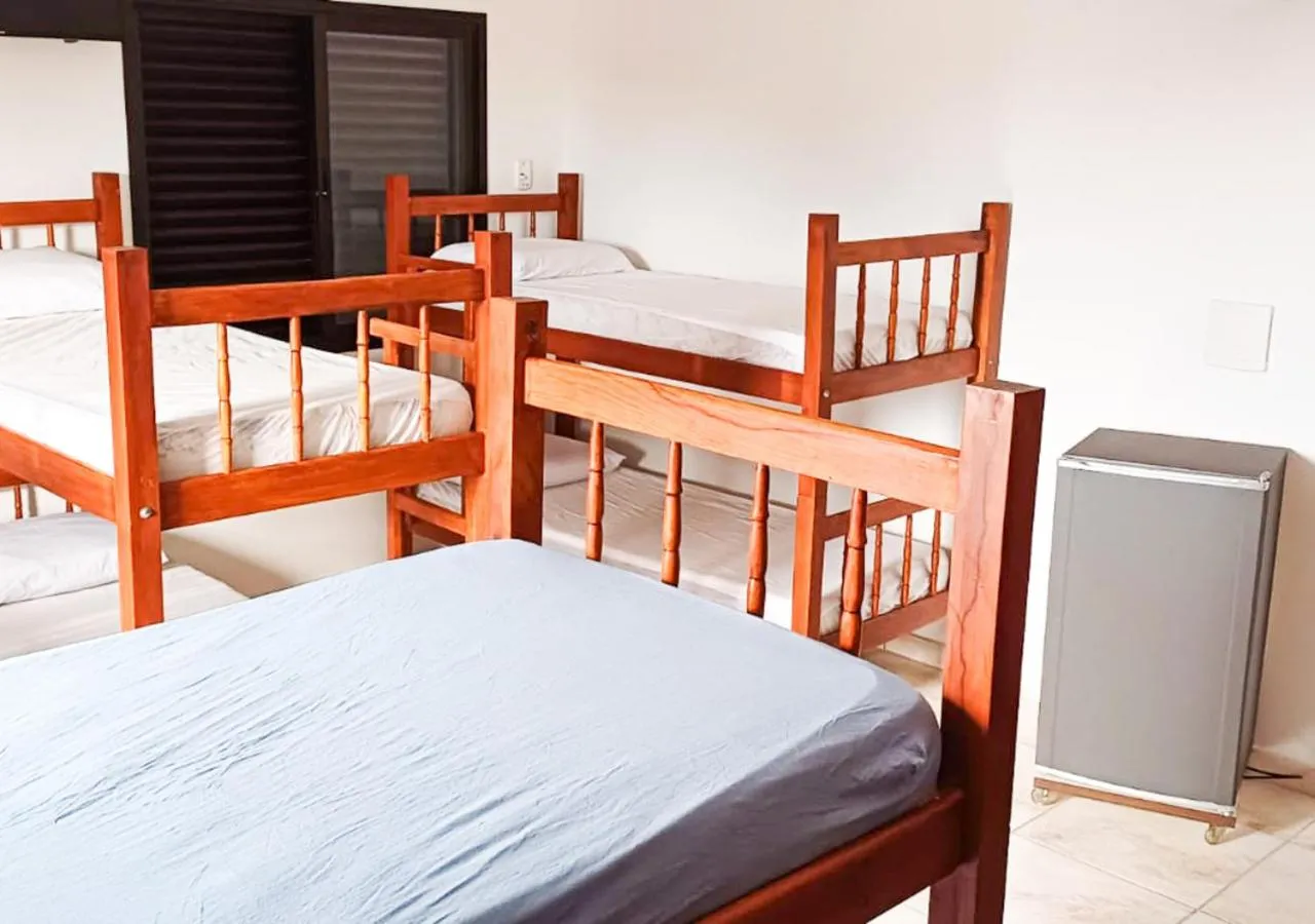 Bed in Pousada Nereidas