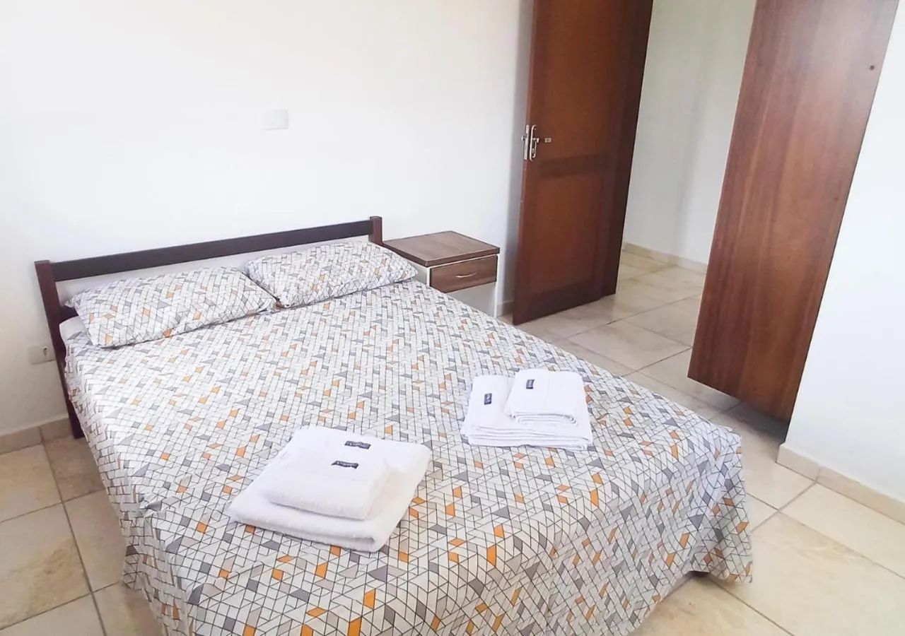 Bed in Pousada Nereidas