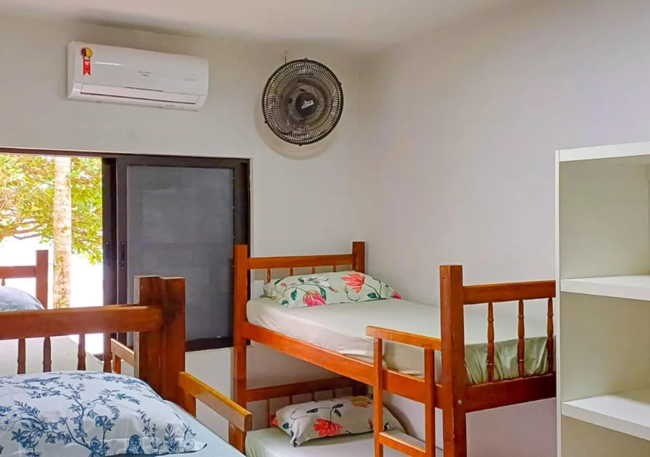 Bed in Pousada Nereidas