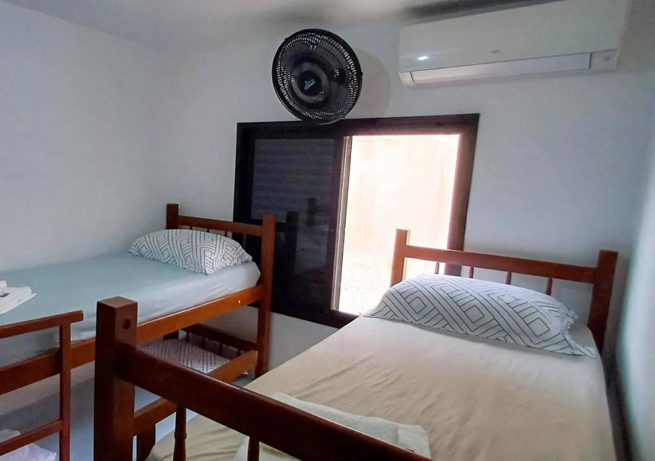 Bed in Pousada Nereidas
