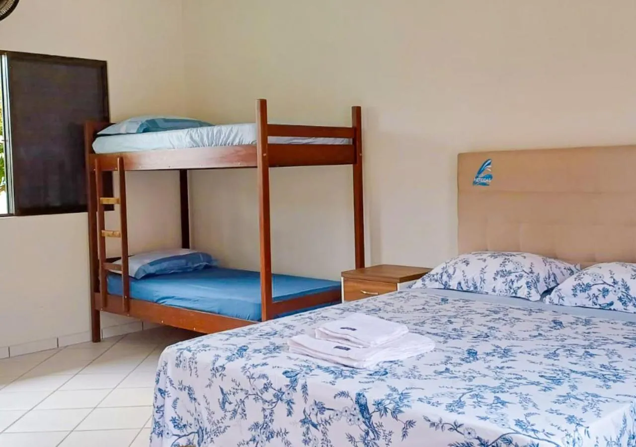 Bed in Pousada Nereidas