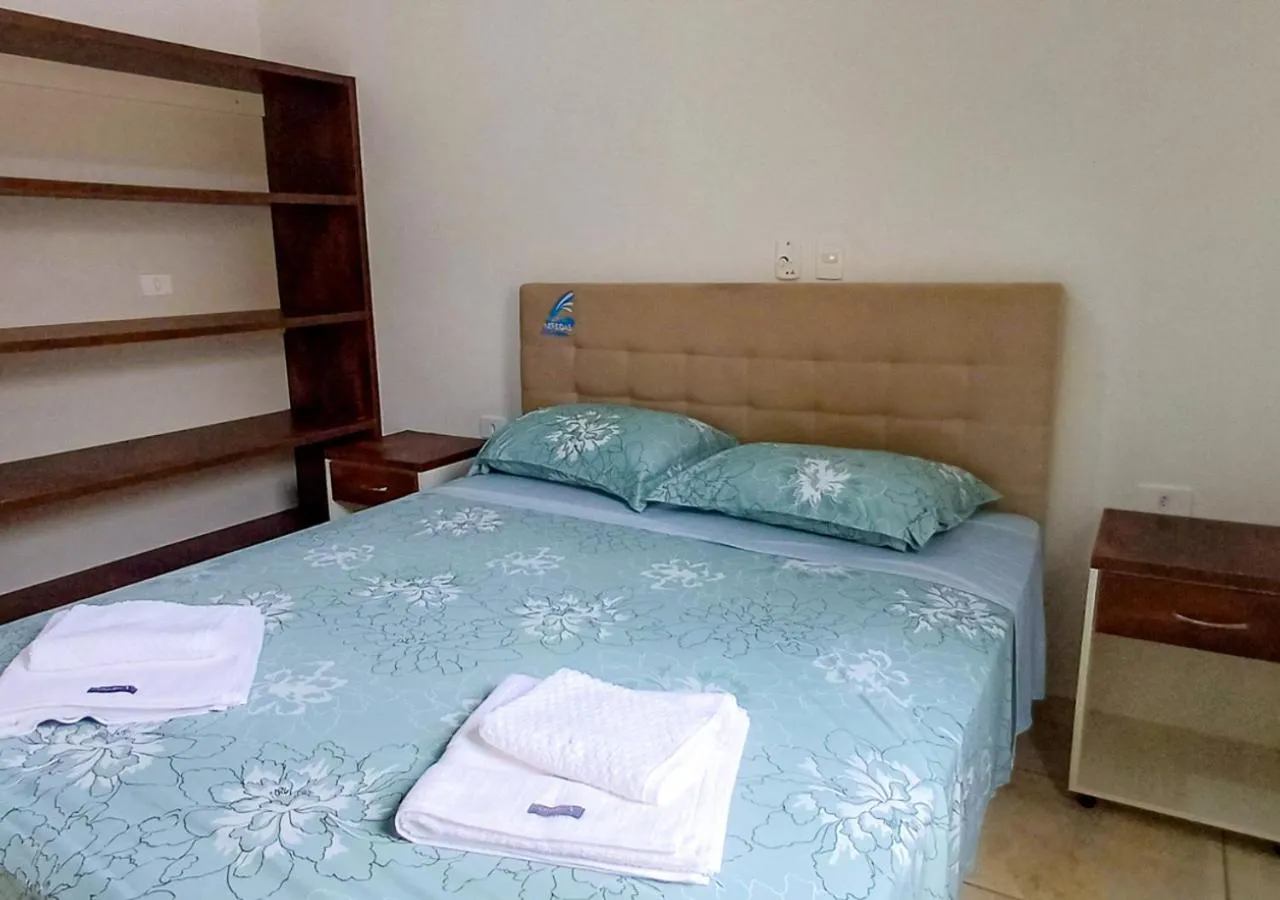 Bed in Pousada Nereidas