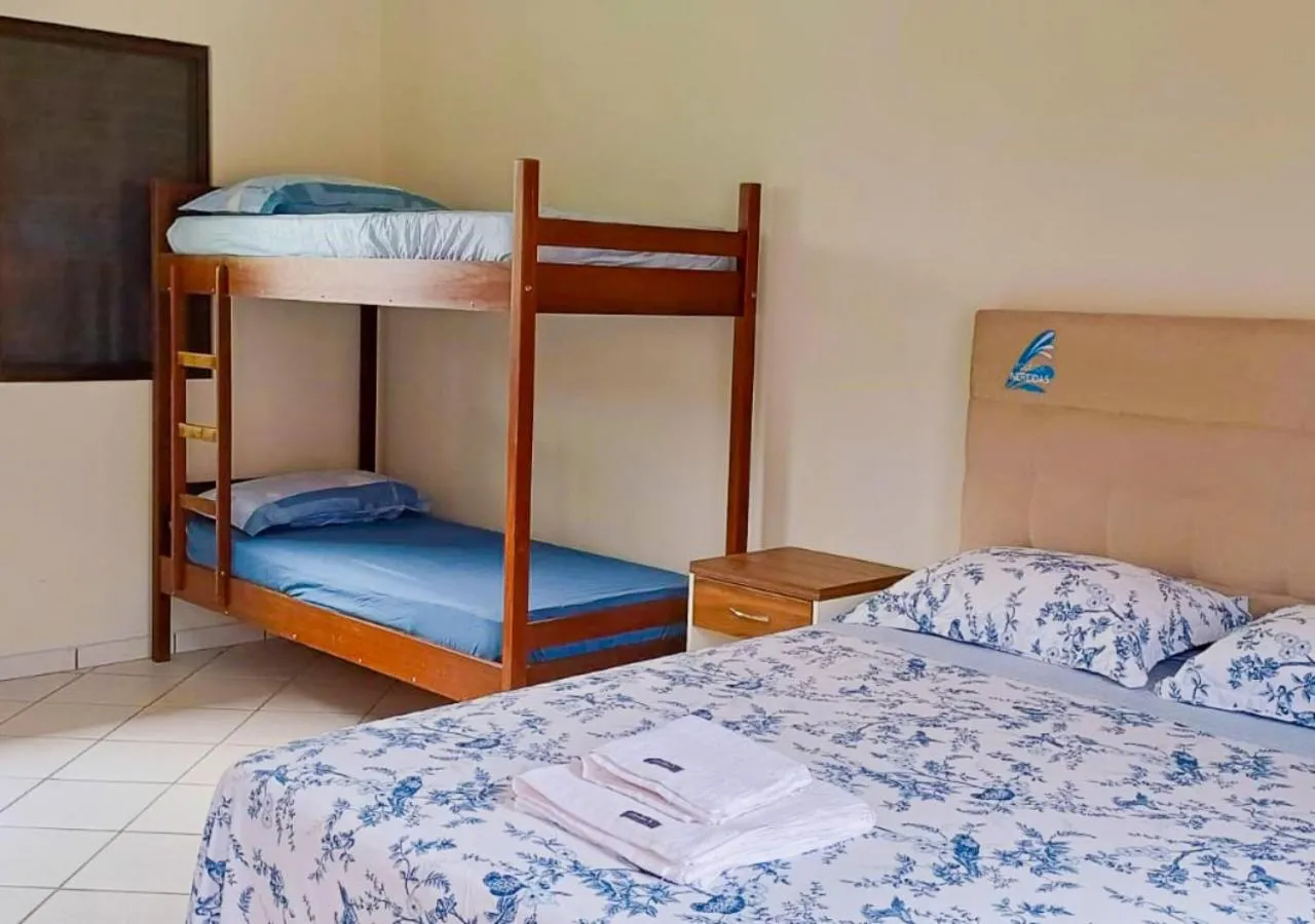 Bed in Pousada Nereidas