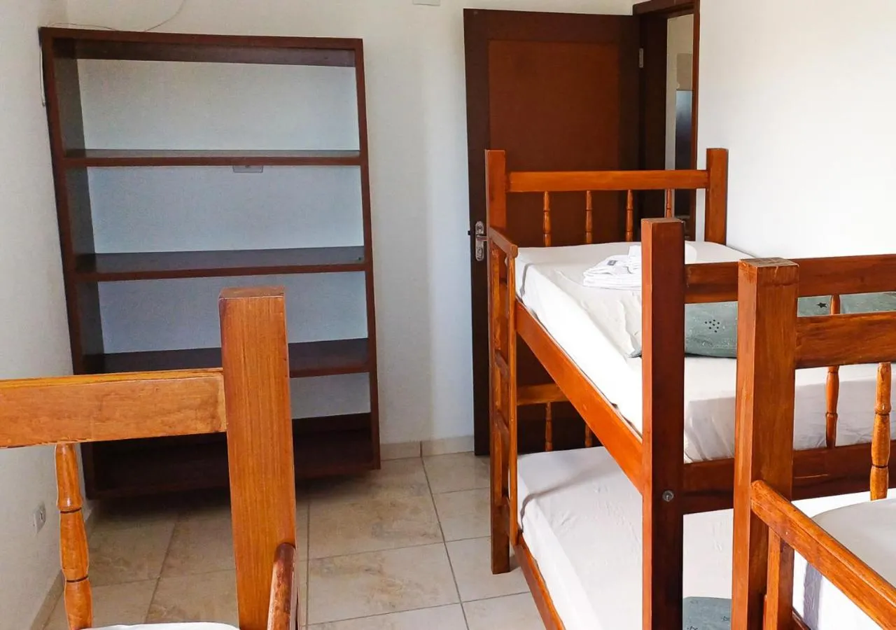 Bed in Pousada Nereidas