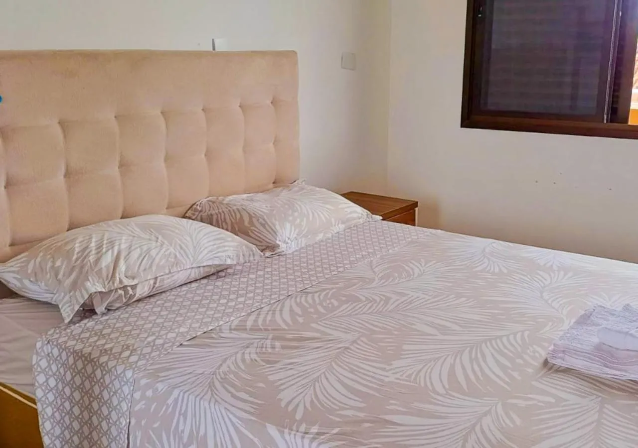 Bed in Pousada Nereidas