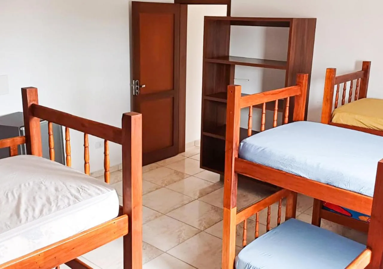 Bed in Pousada Nereidas