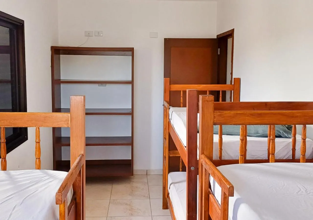 Bed in Pousada Nereidas