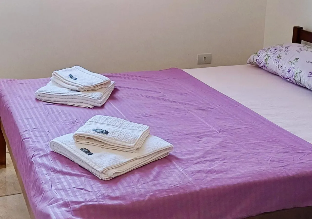 Bed in Pousada Nereidas