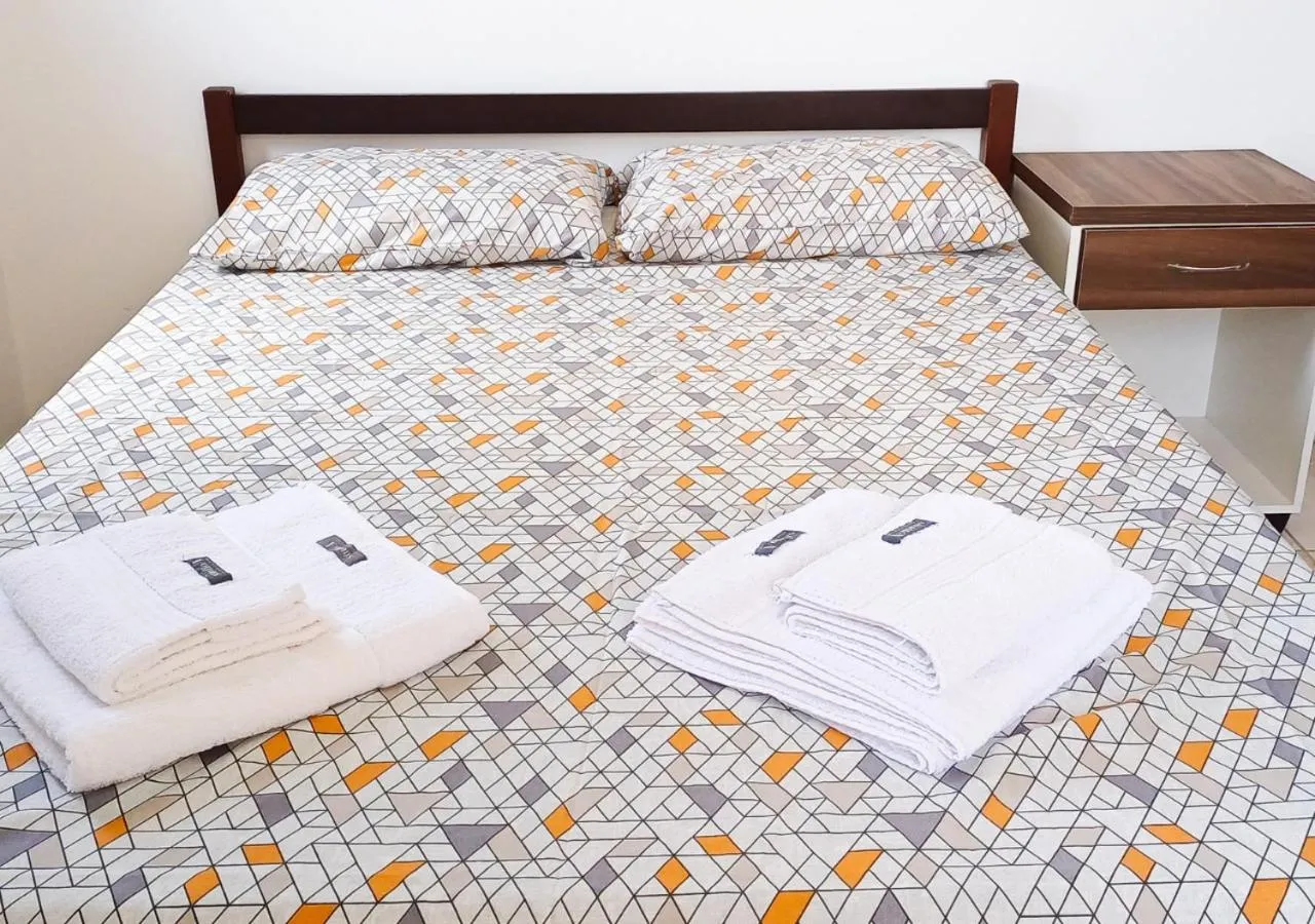 Bed in Pousada Nereidas