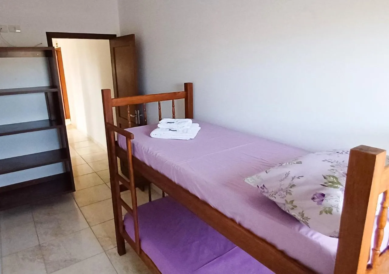 Bed in Pousada Nereidas