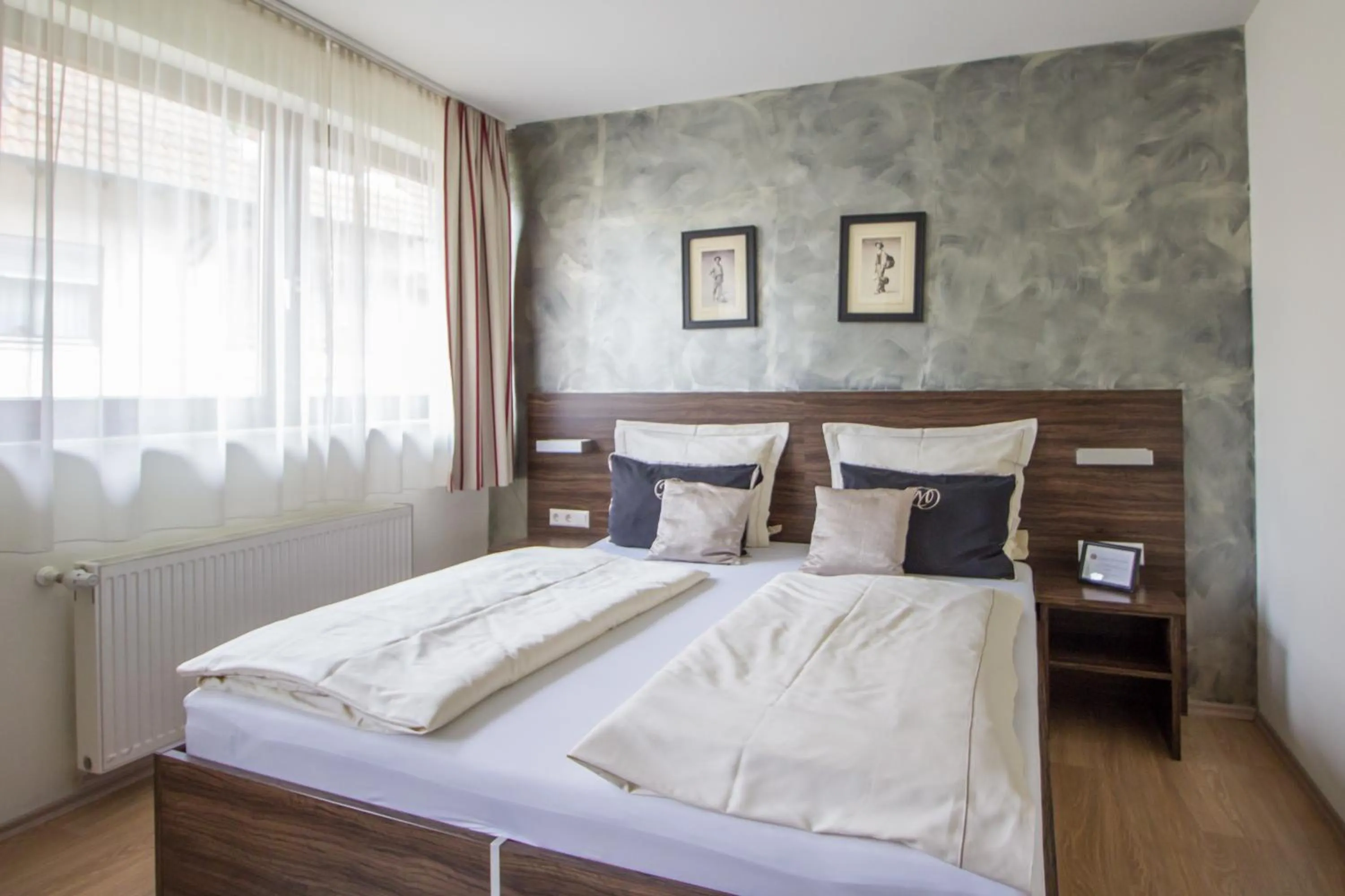 Photo of the whole room, Bed in Landhotel Wolfschlugen