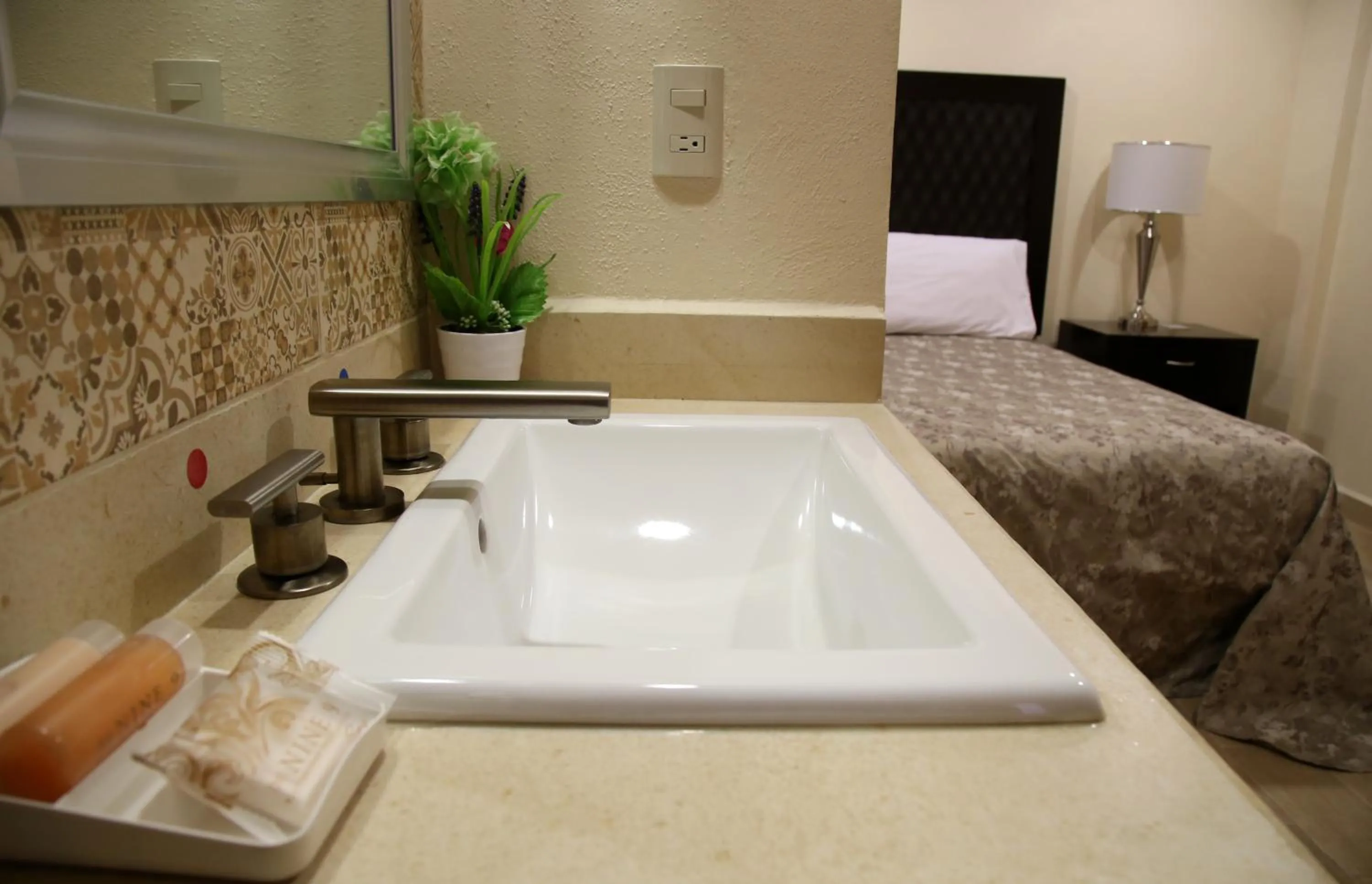 Decorative detail, Bed in Hotel Plaza Bernal