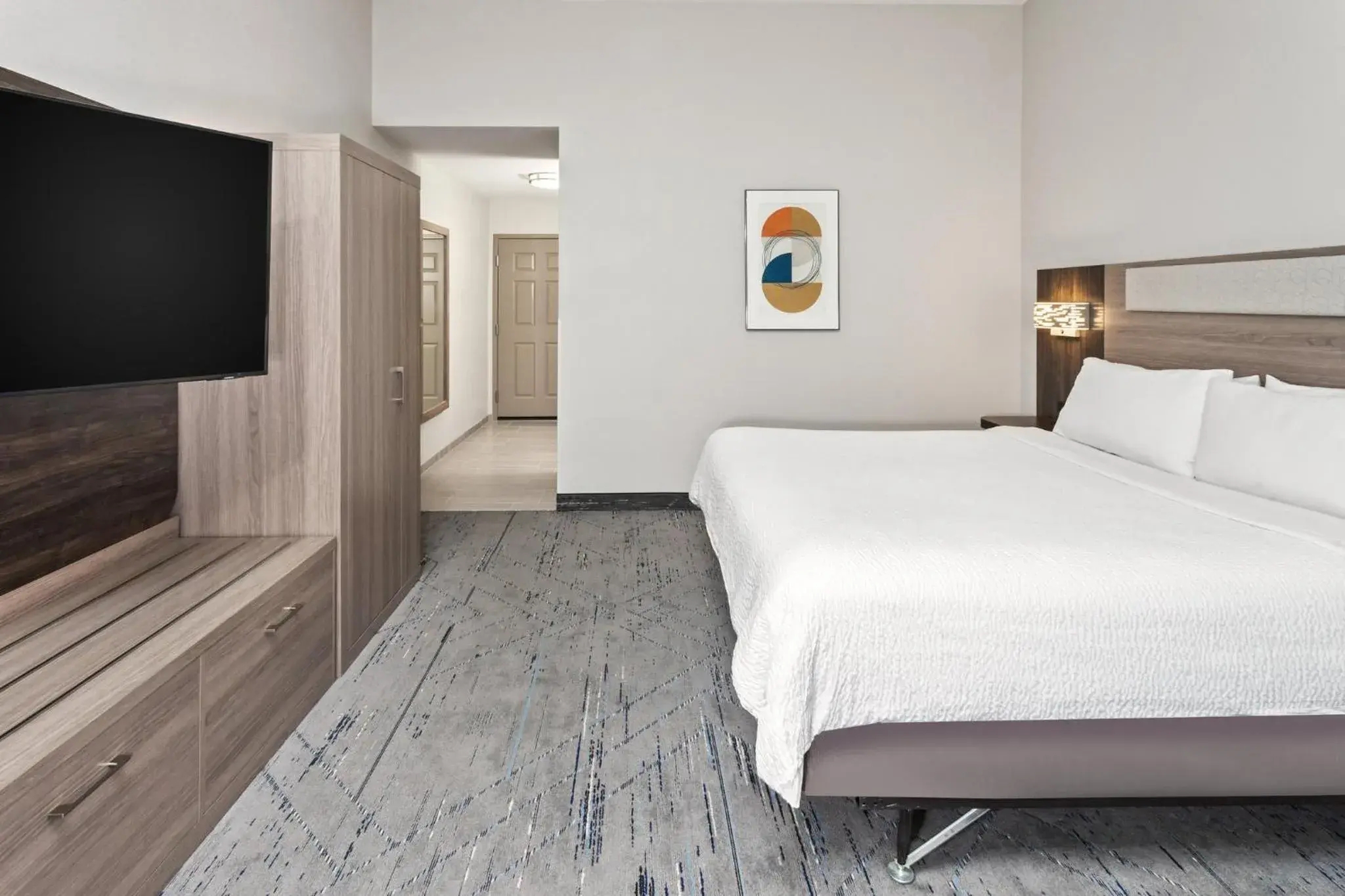 Photo of the whole room, Bed in Holiday Inn Express & Suites Chicago West-O'Hare Arpt Area by IHG Photo of the whole room, Bed in Holiday Inn Express & Suites Chicago West-O'Hare Arpt Area by IHG