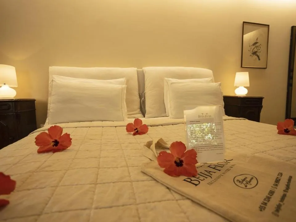 Bed in Beija Flor Exclusive Hotel & Spa