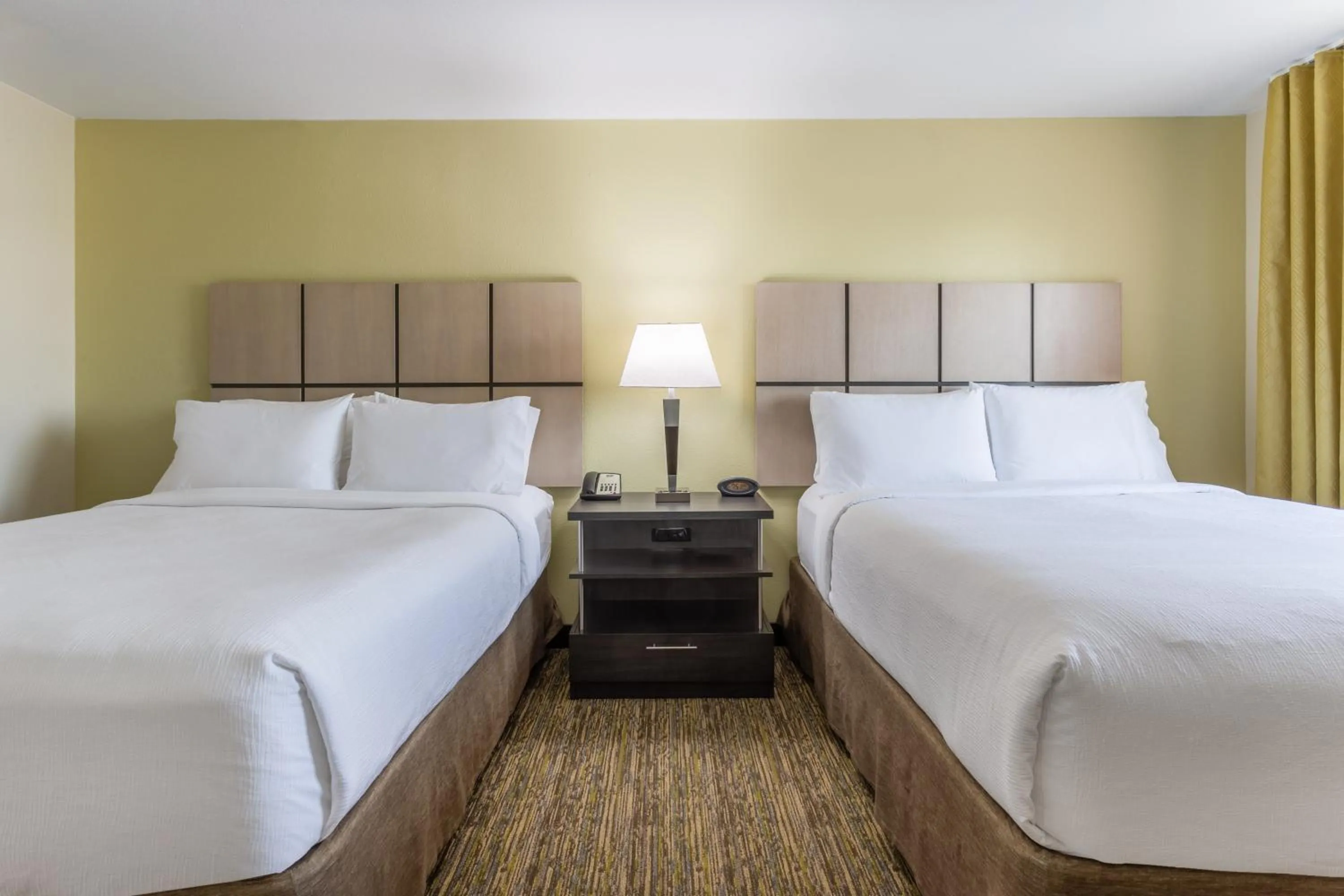 Photo of the whole room, Bed in Candlewood Suites Aurora-Naperville by IHG