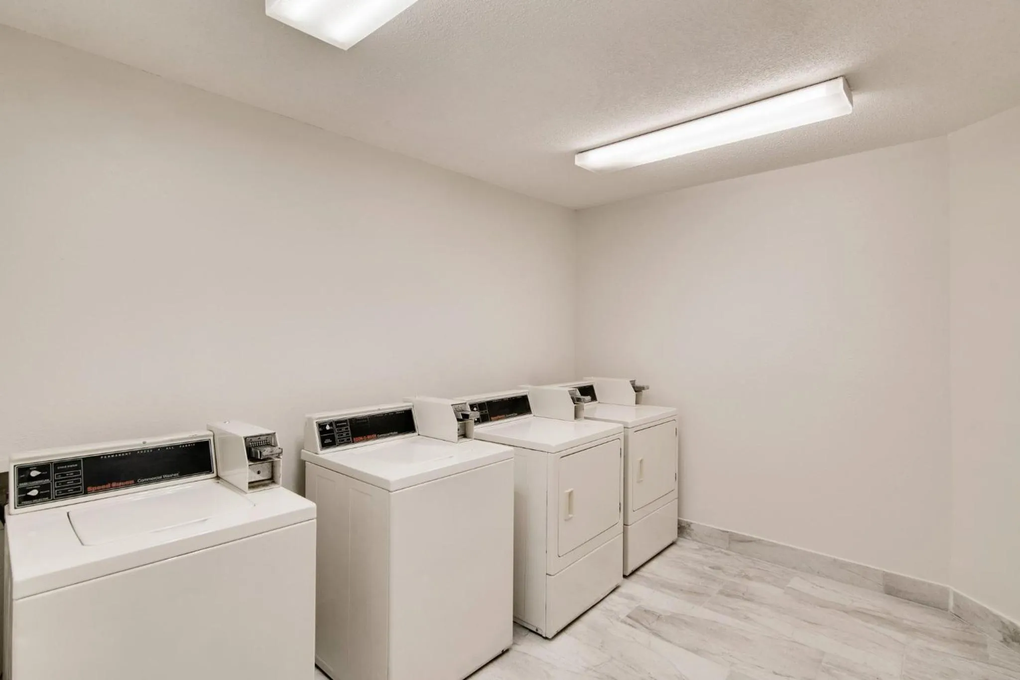 laundry in Red Roof Inn & Suites Pensacola-NAS Corry