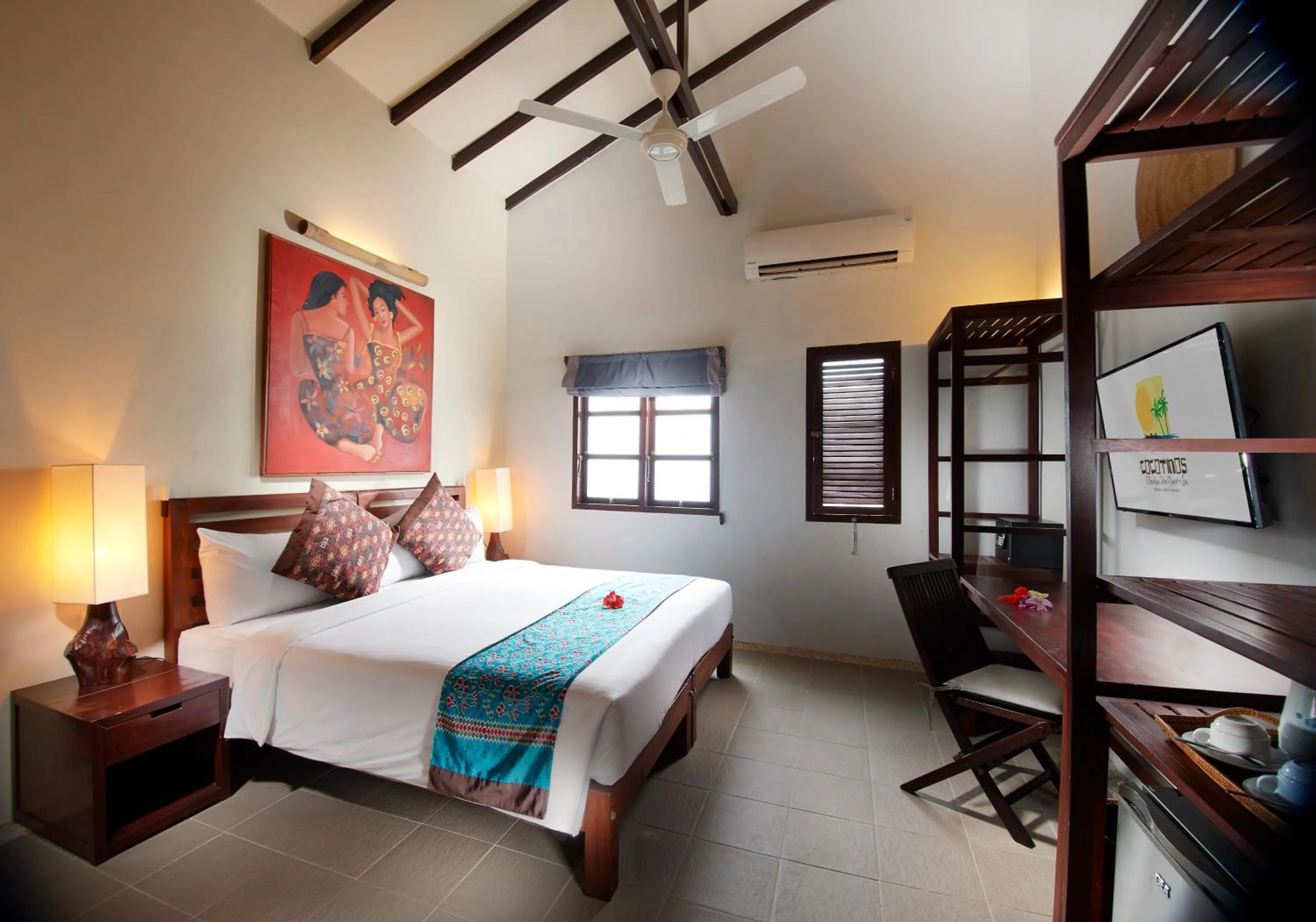 Bed in Cocotinos Lembeh a Boutique Dive Lodge