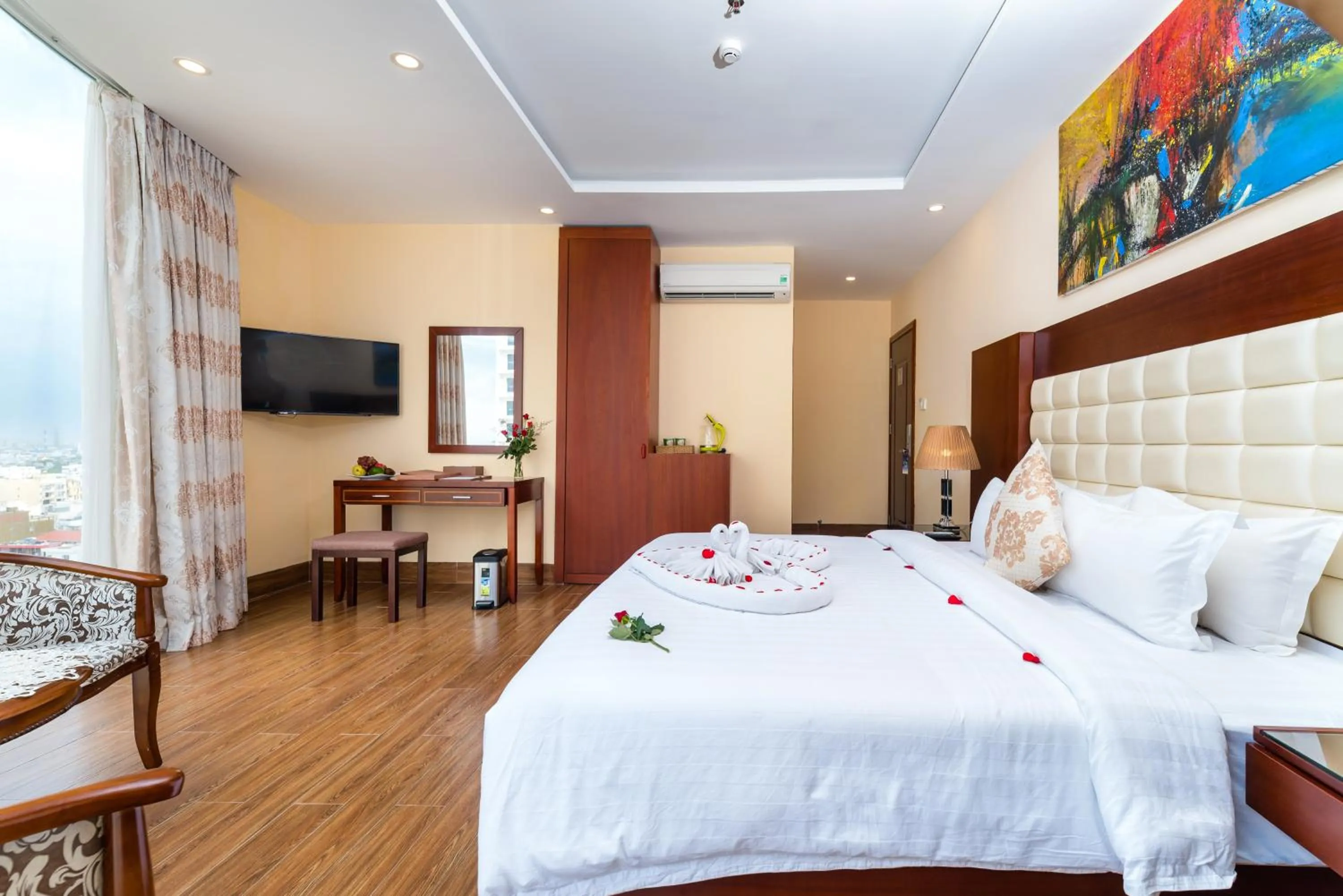 Living room, Bed in Nhat Minh Hotel and Apartment