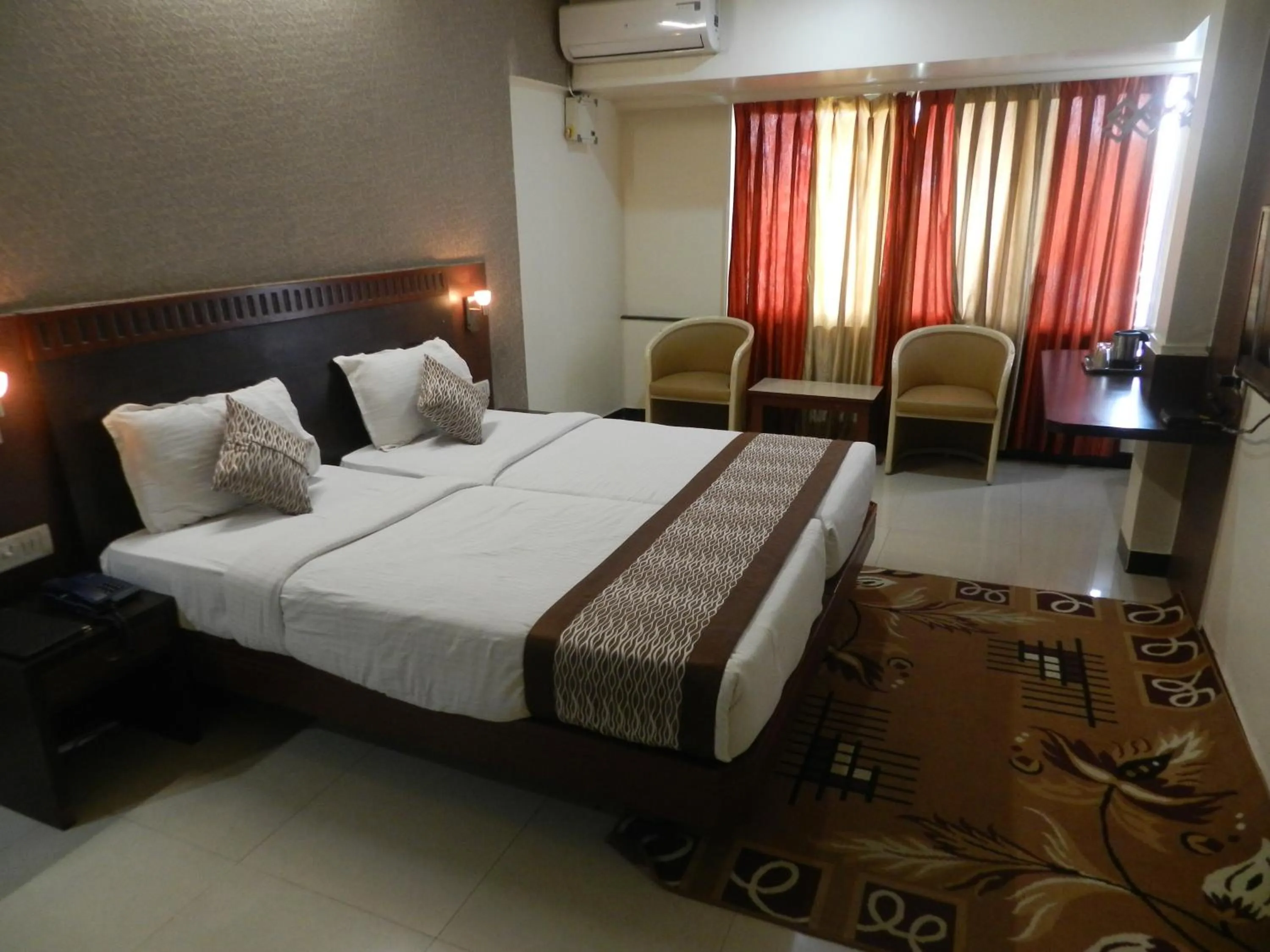 Bed in Hotel Ayodhya