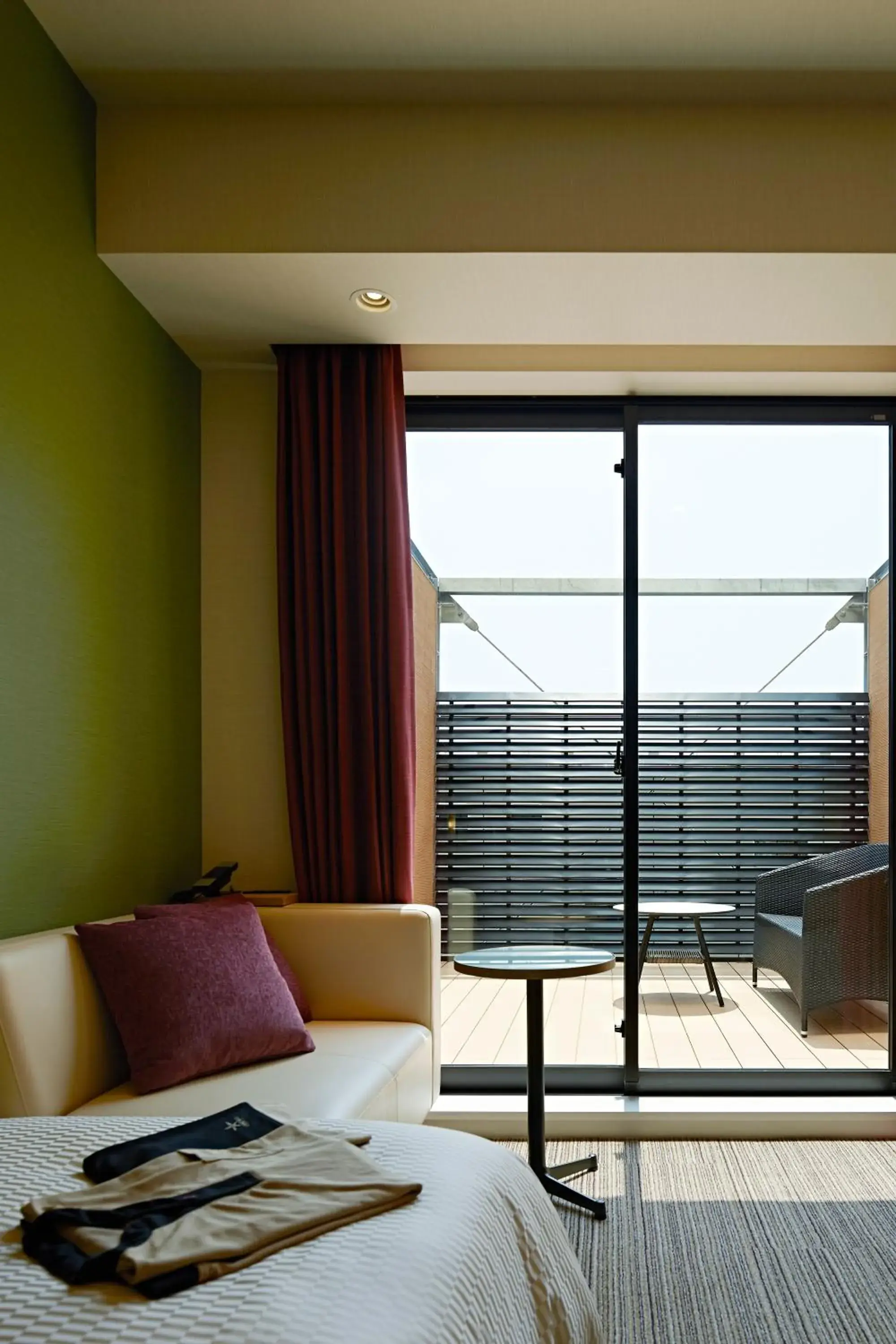 Balcony/Terrace, Bed in Candeo Hotels Matsuyama Okaido Balcony/Terrace, Bed in Candeo Hotels Matsuyama Okaido