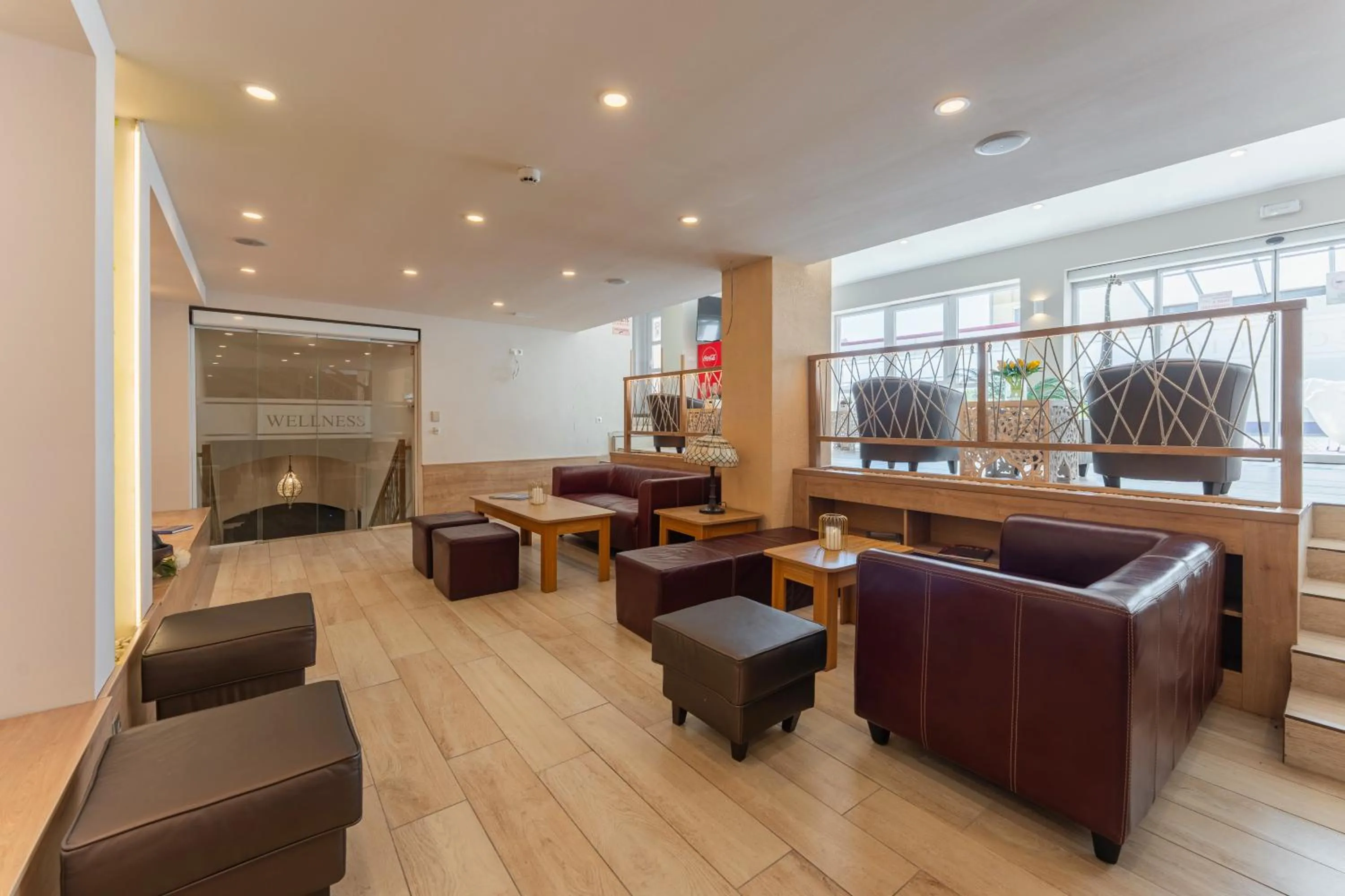 Communal lounge/ TV room in OÁZIS Hotel***