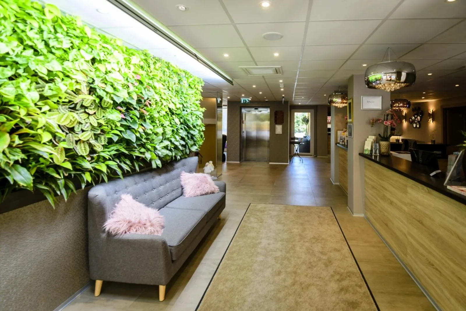 Lobby or reception in The Hotel Unforgettable - Hotel Tiliana by Homoky Hotels & Spa