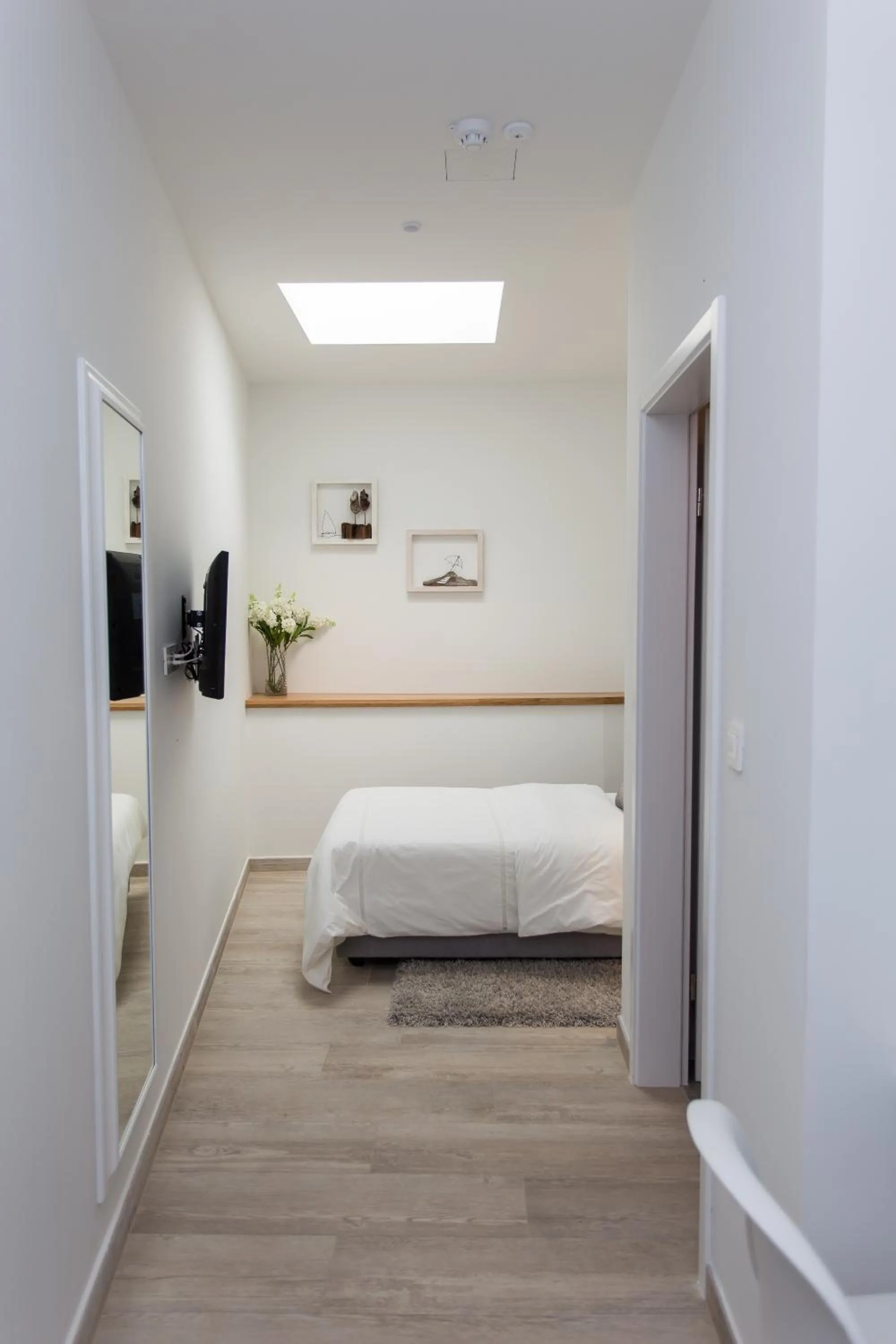 Bed in Bifora Heritage Hotel