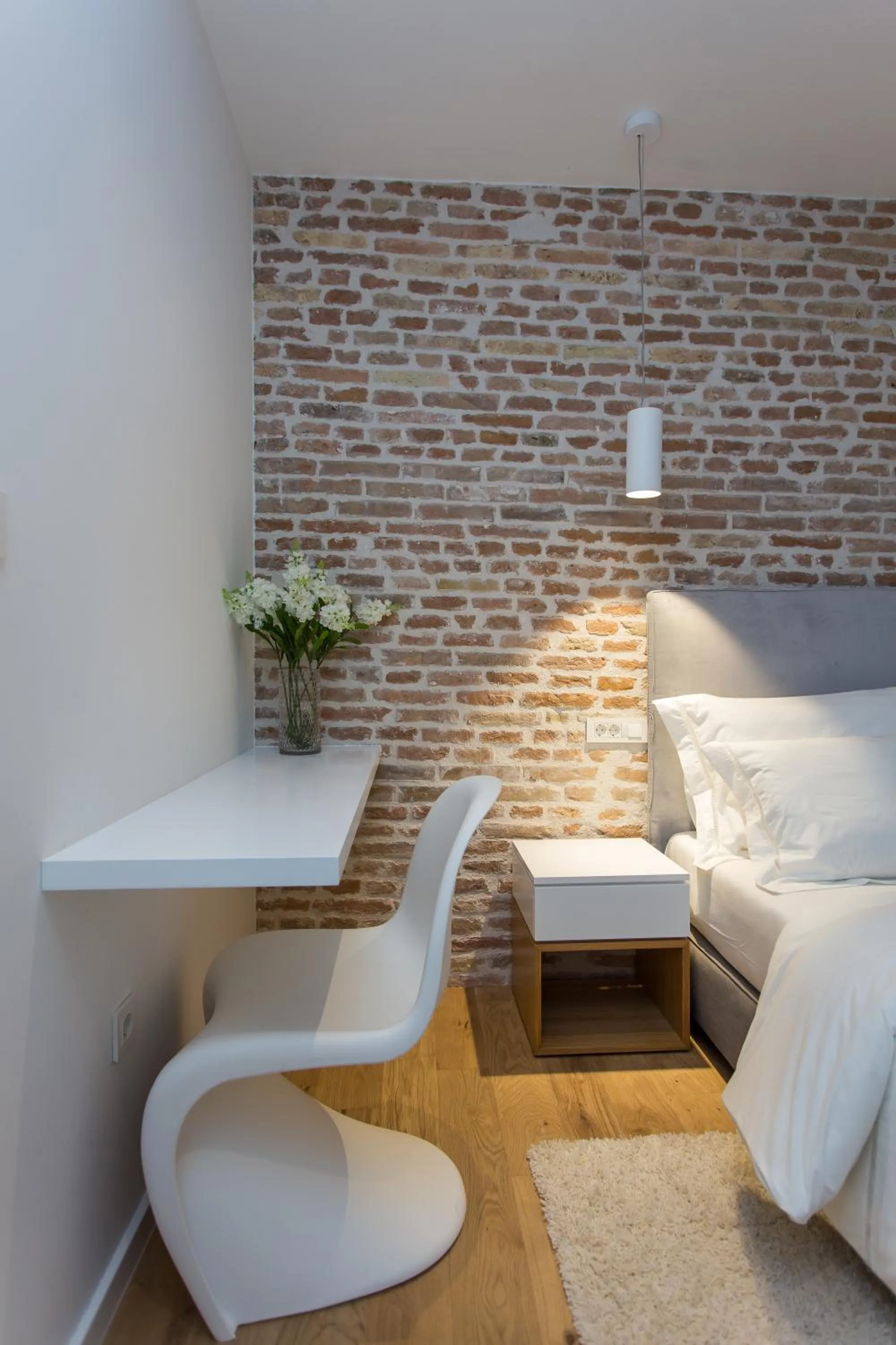 Bed in Bifora Heritage Hotel