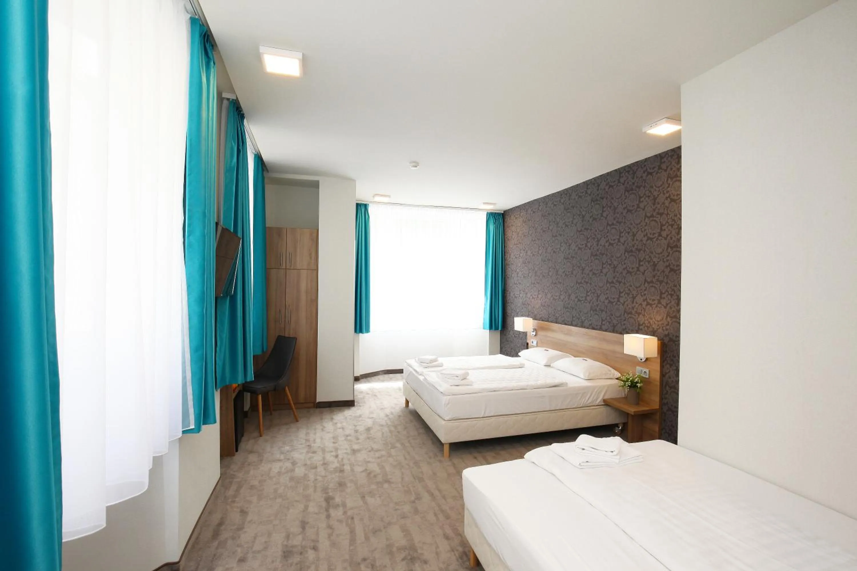 Living room, Bed in Medos Hotel