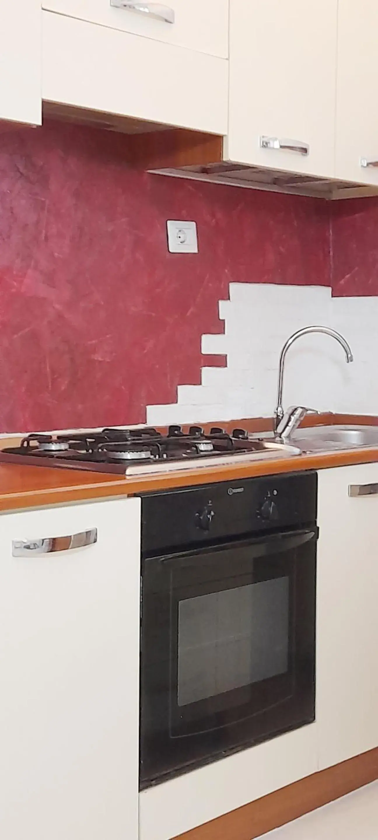 Kitchen or kitchenette in A casa tua Ostia Antica Kitchen or kitchenette in A casa tua Ostia Antica