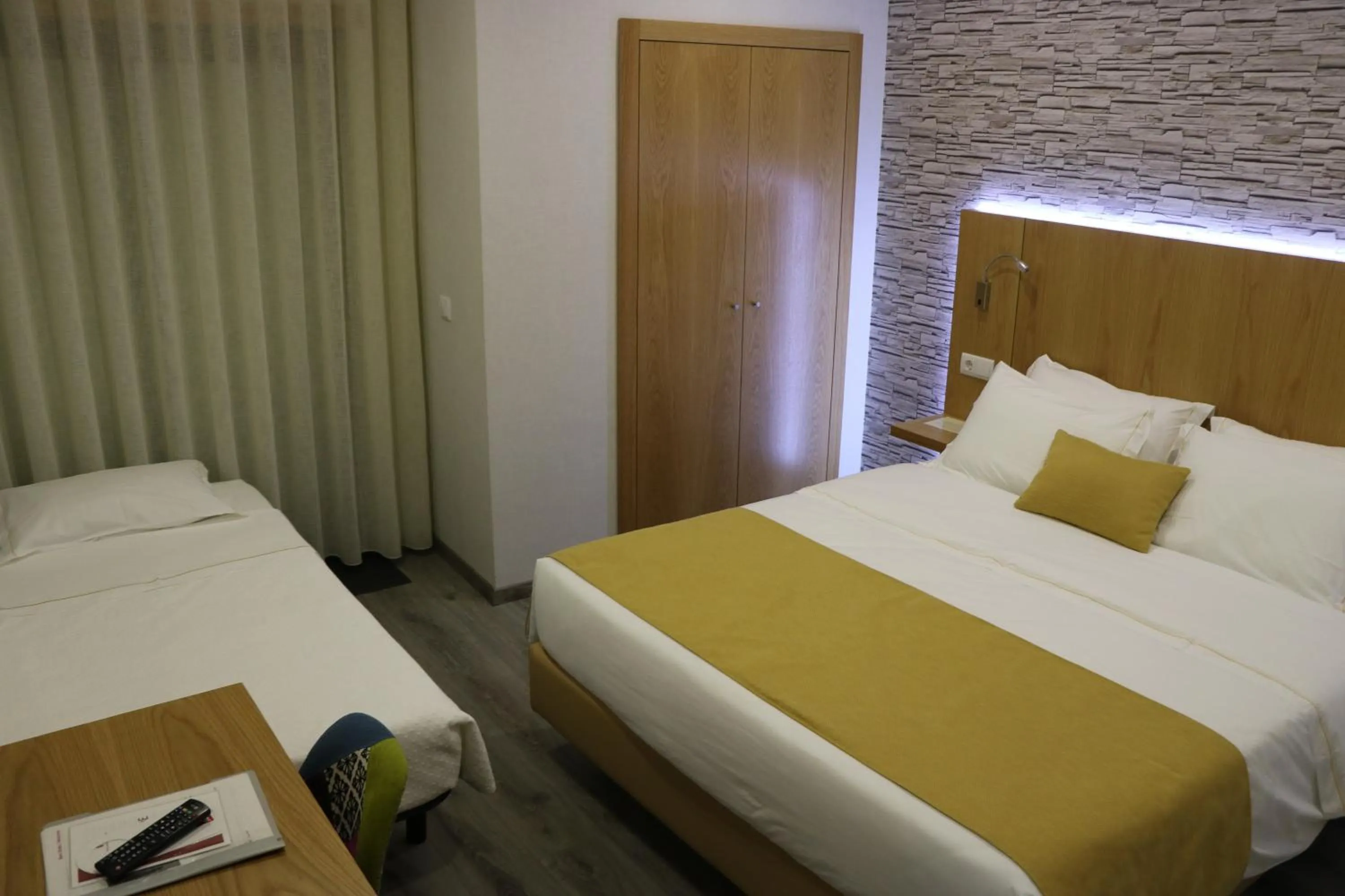 Bed in Hotel Império do Norte