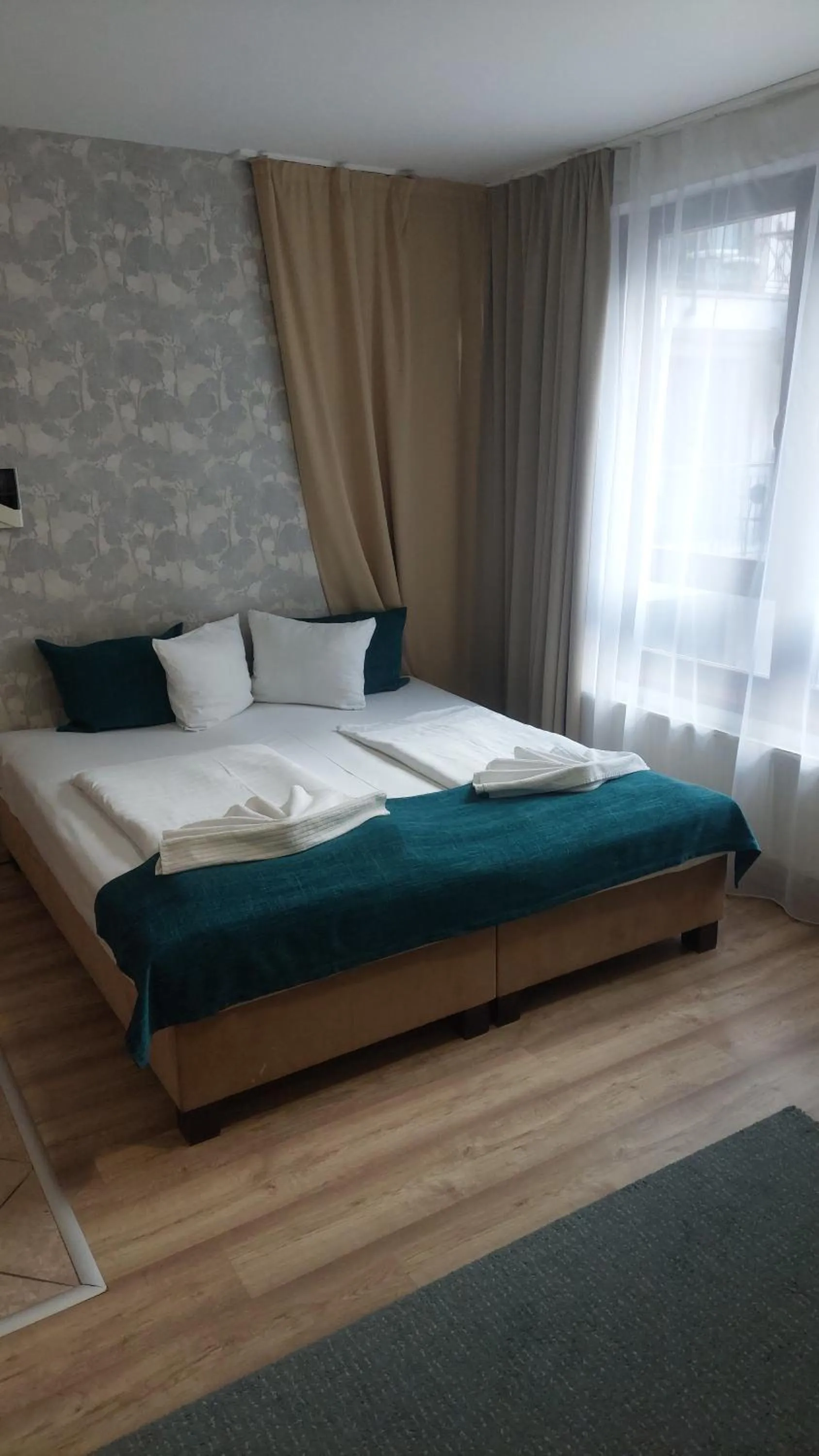 Bed in Mango Apartments