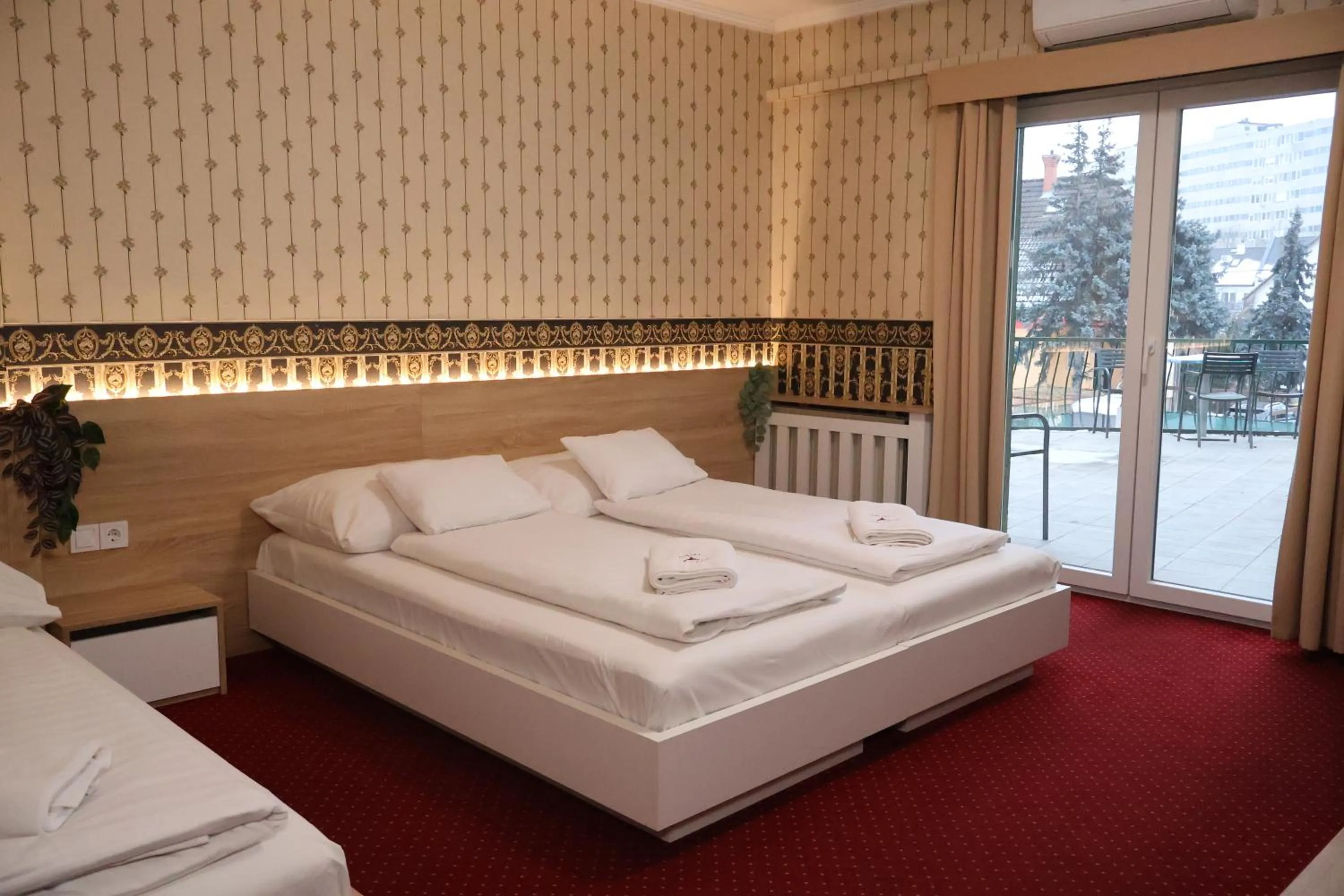 Bed in Hotel Amadeus