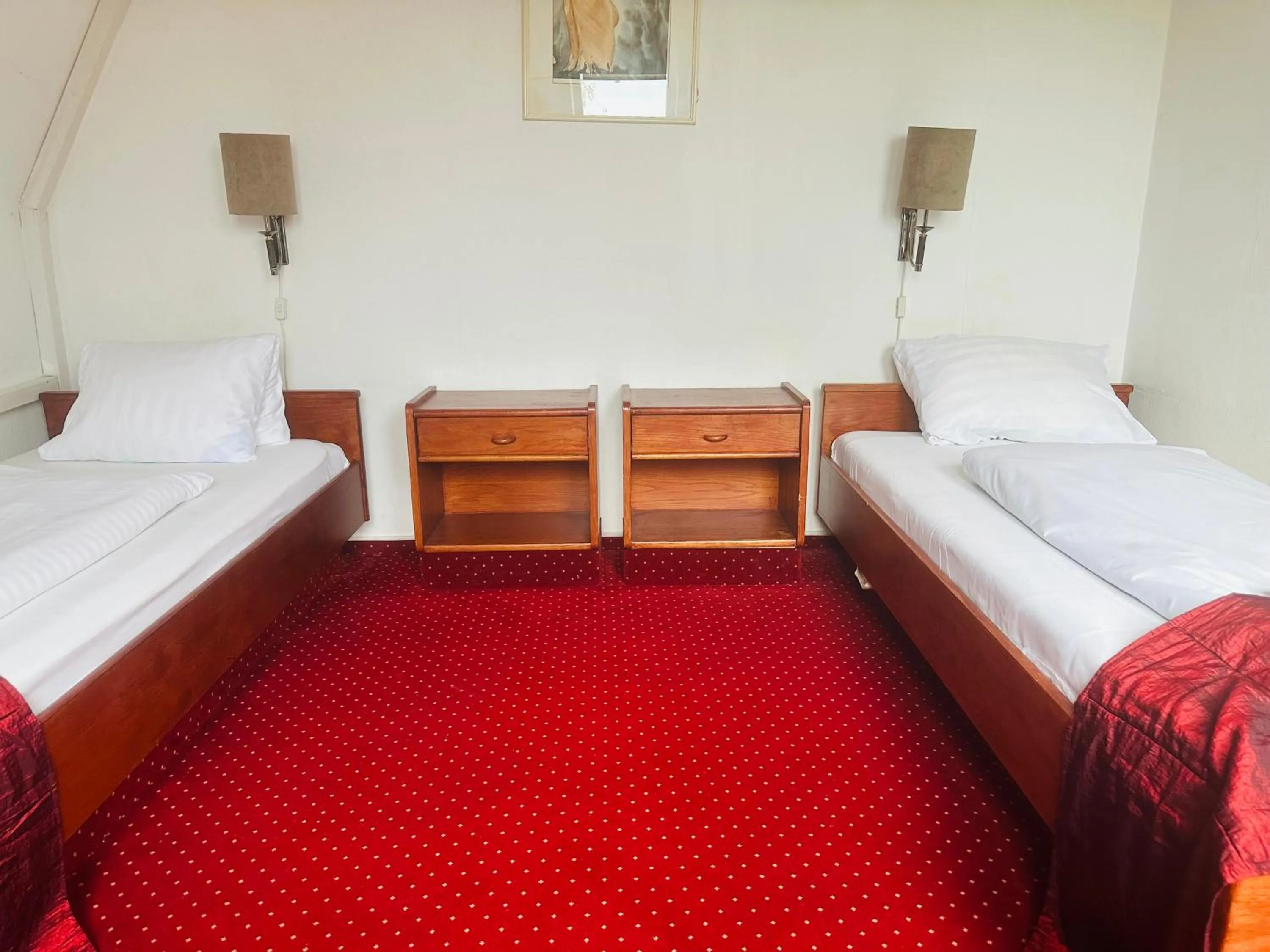 Bed in Hotel Amadeus