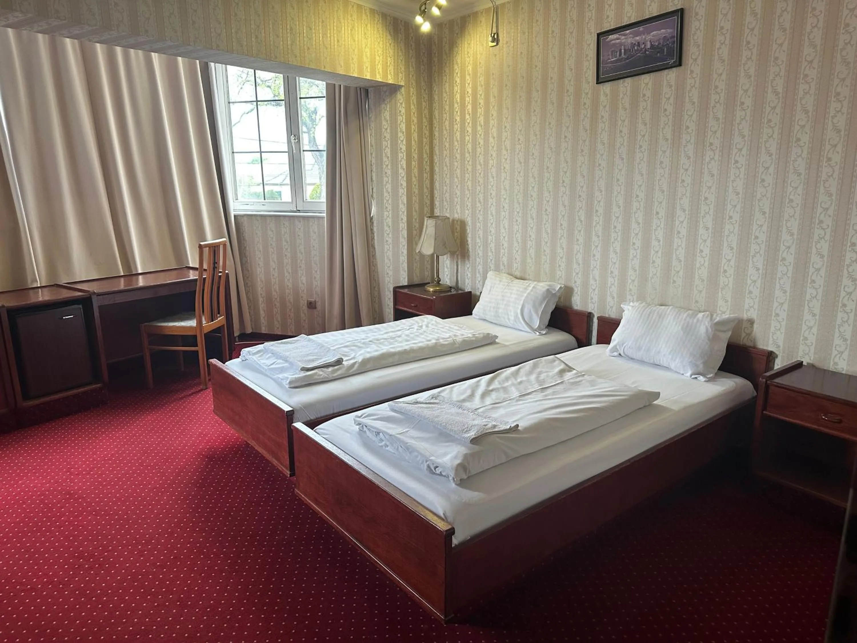 Bed in Hotel Amadeus