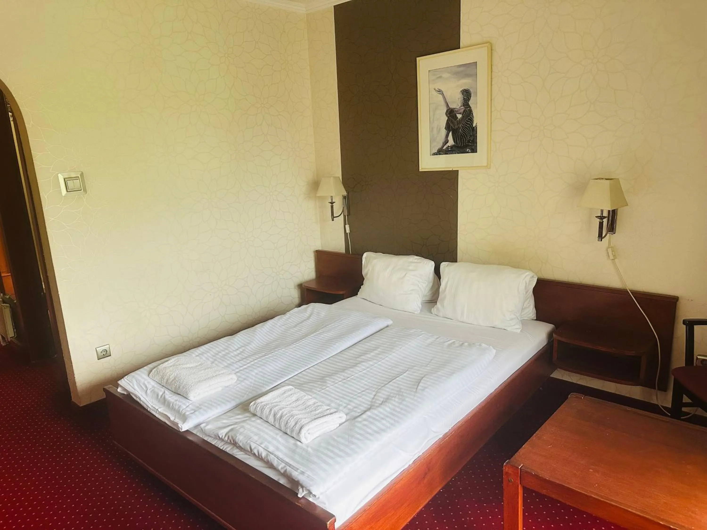 Bed in Hotel Amadeus