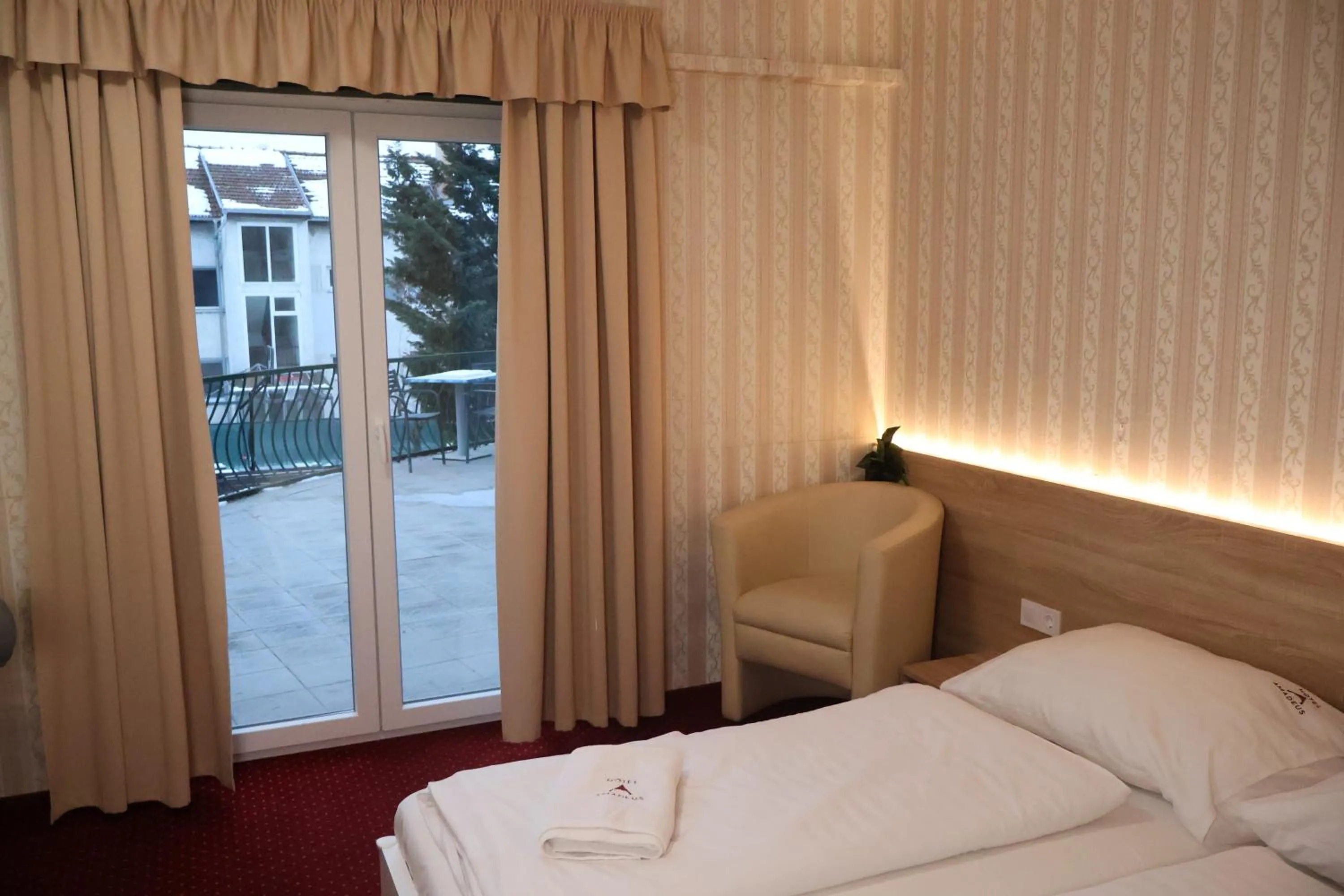 Bed in Hotel Amadeus