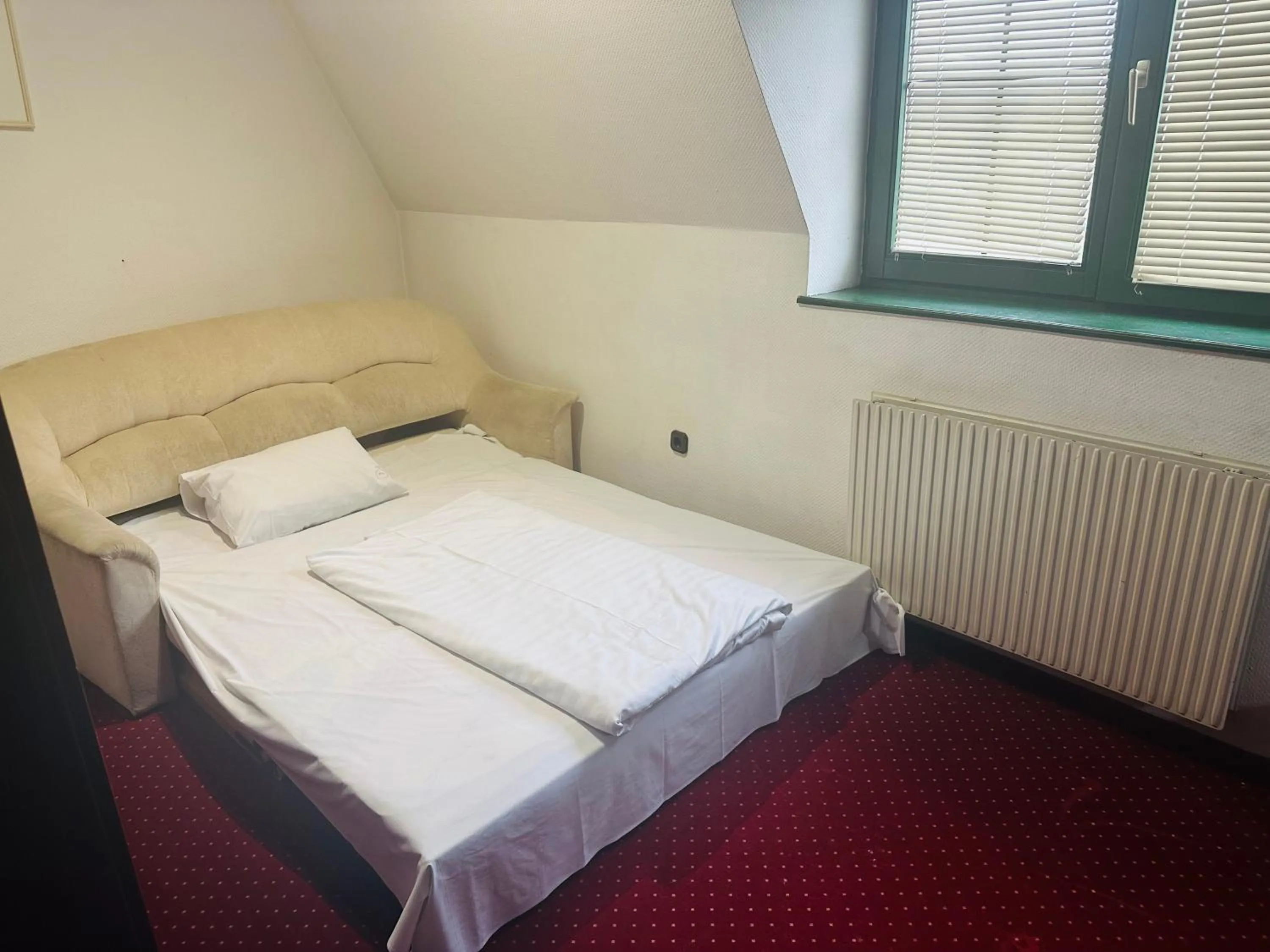 Bed in Hotel Amadeus