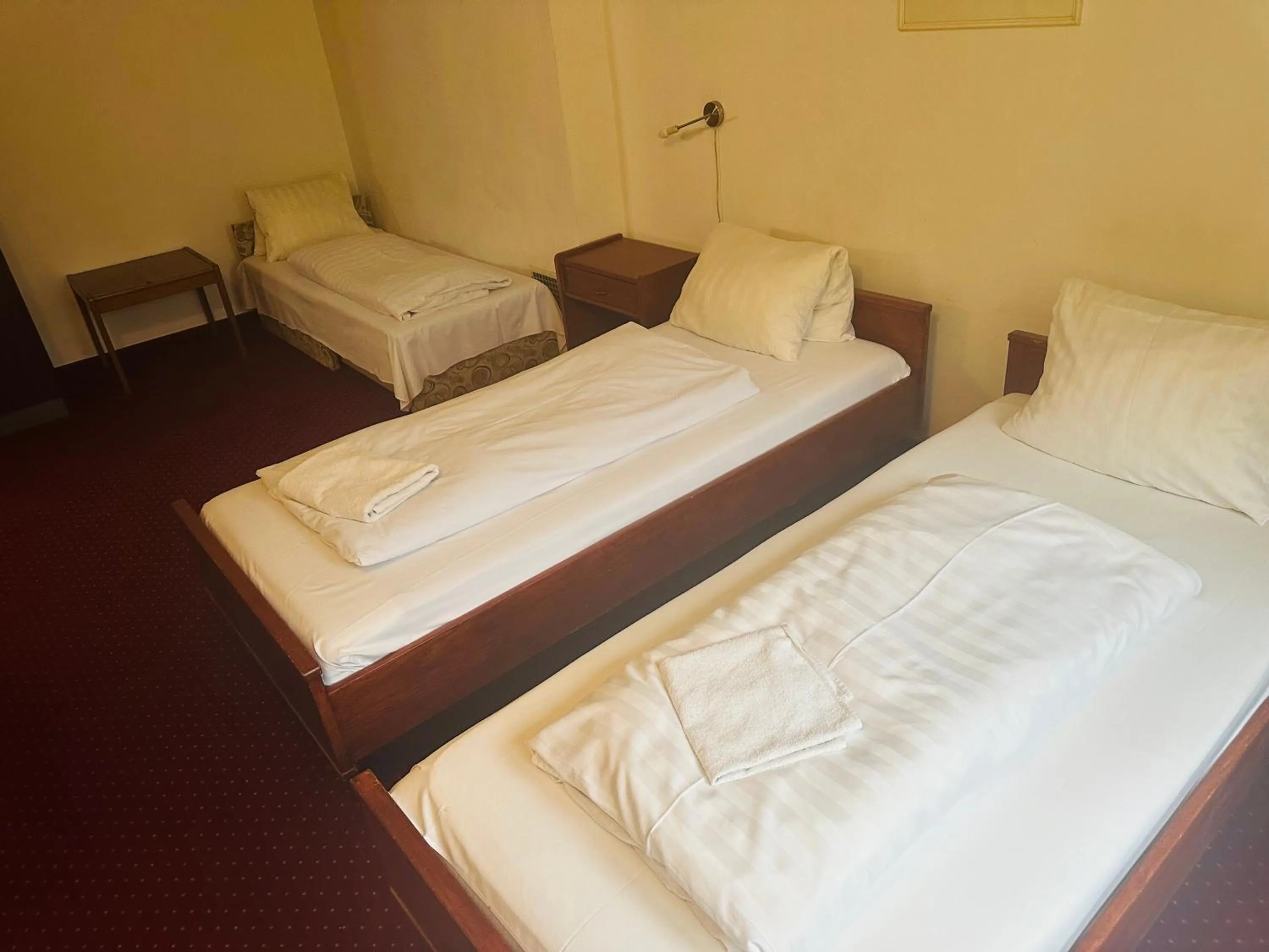 Bed in Hotel Amadeus