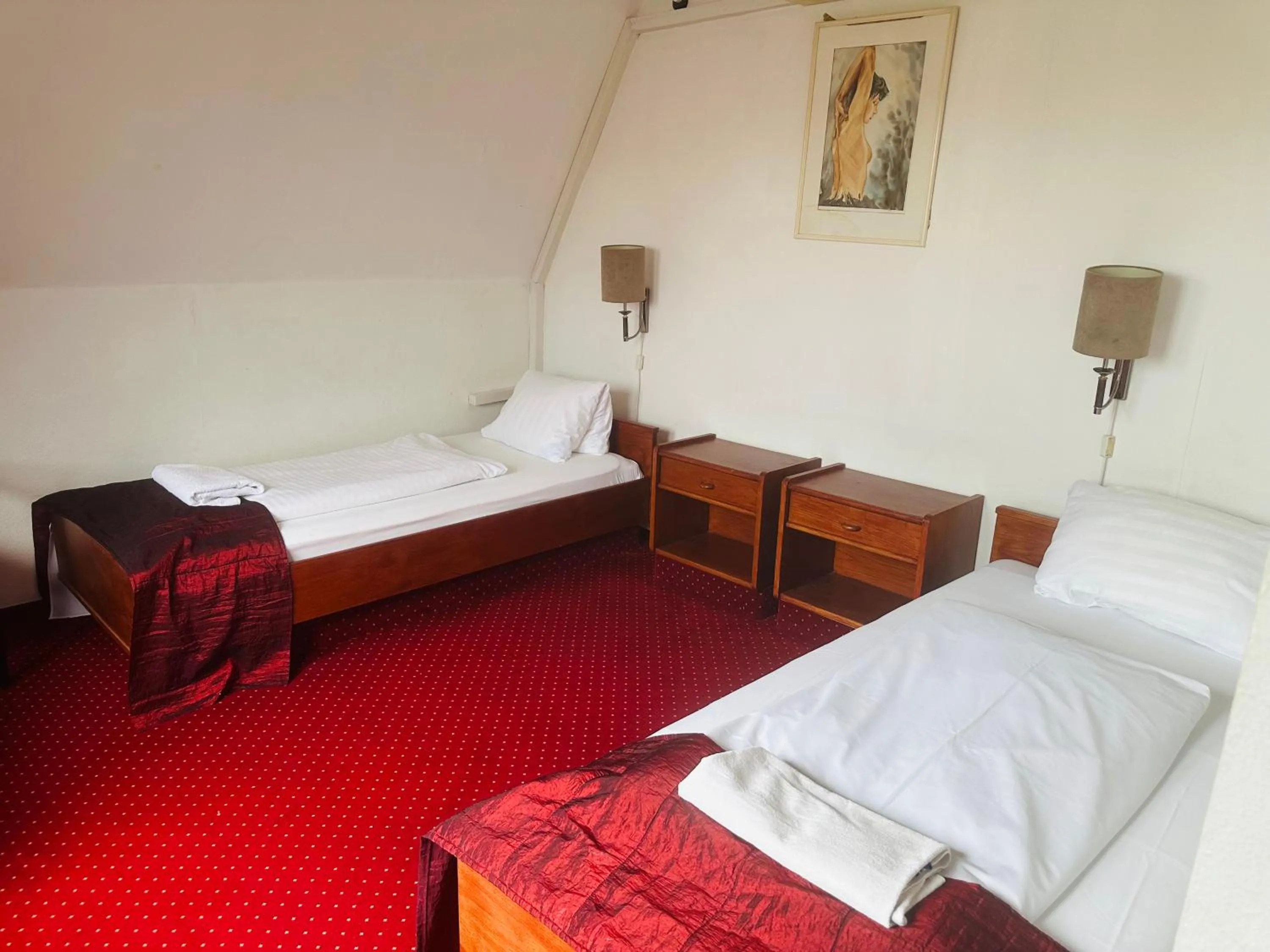 Bed in Hotel Amadeus