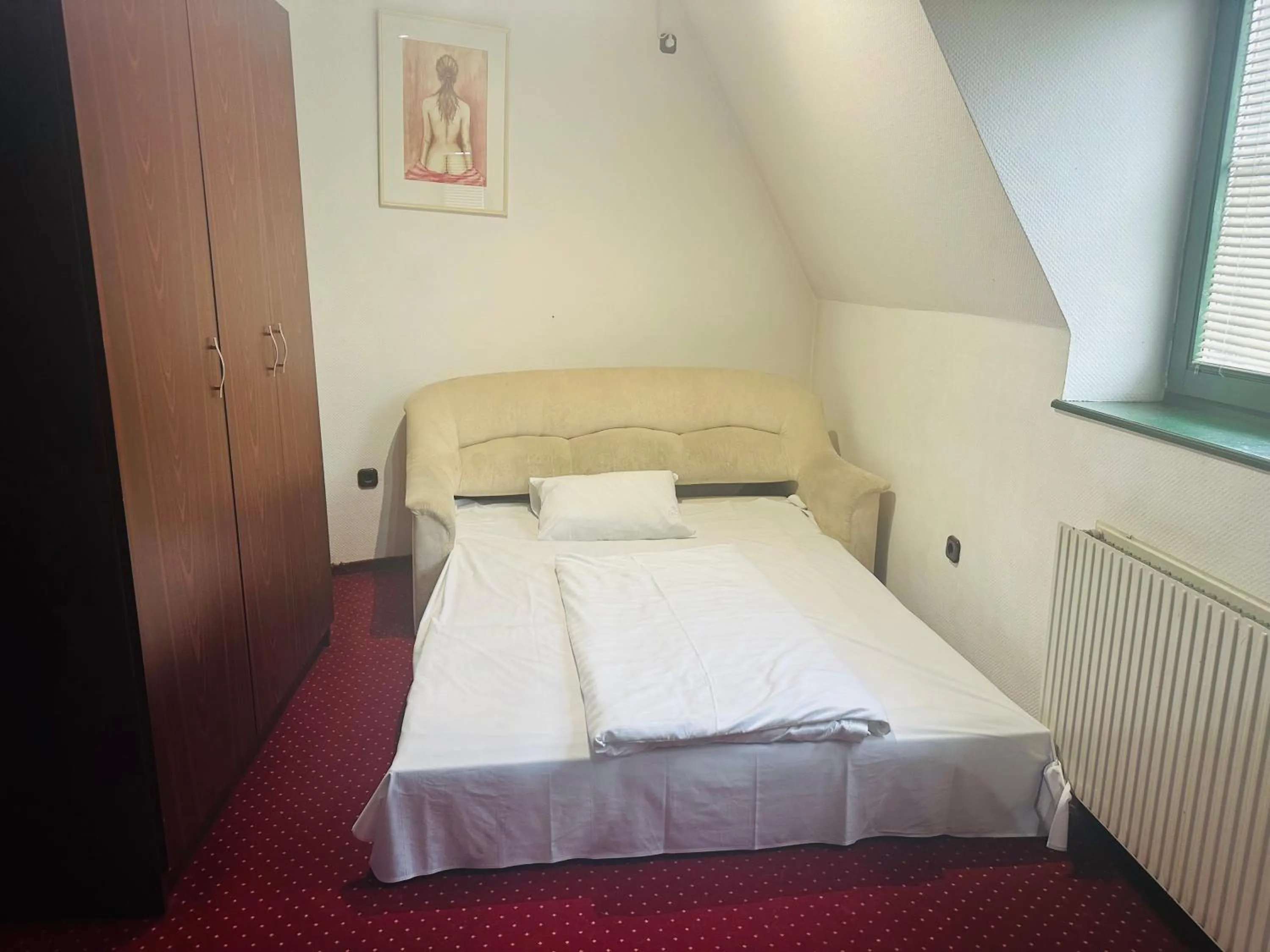 Bed in Hotel Amadeus