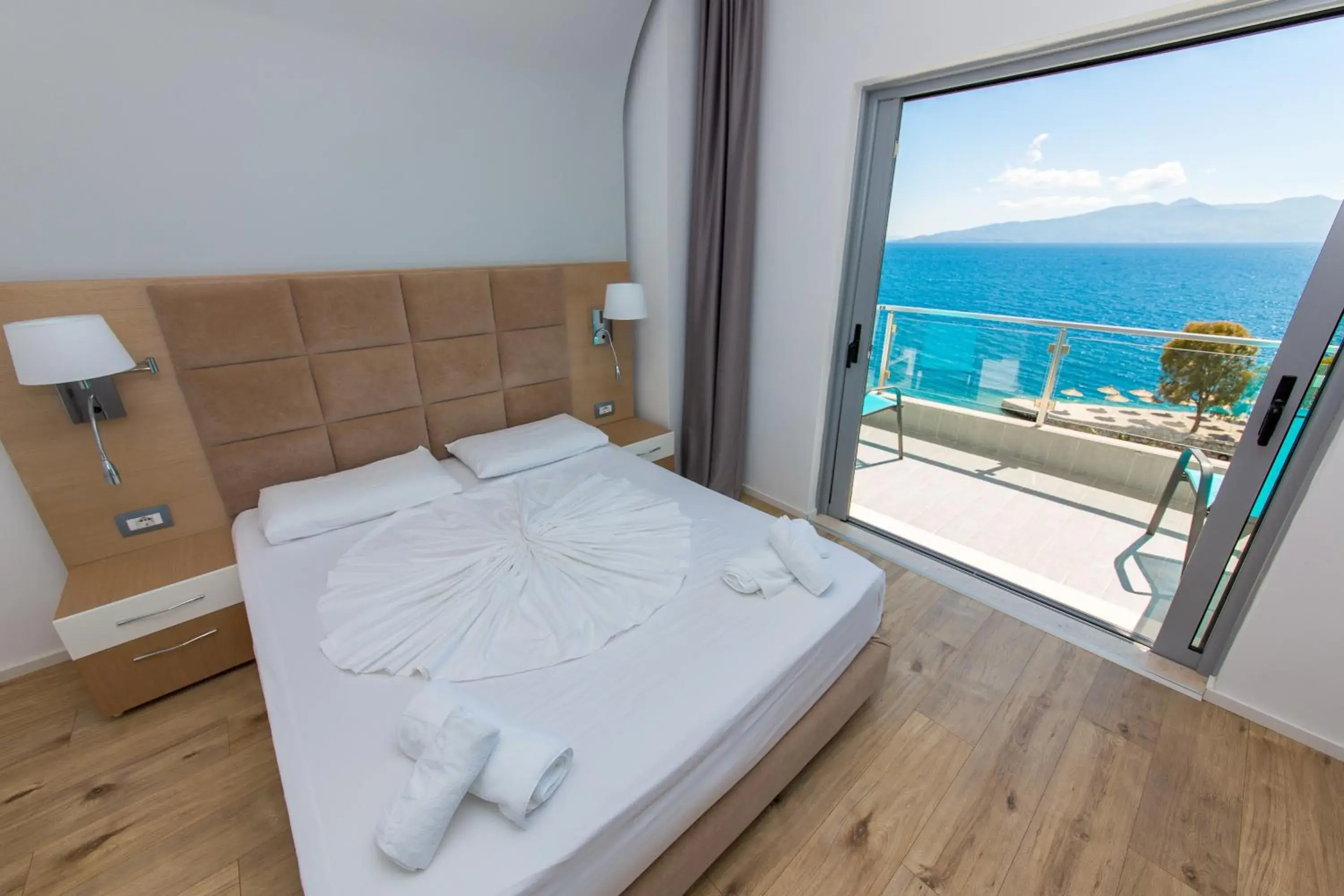 Two-Bedroom Family Room with Balcony and Sea View in Hotel Saranda Palace Two-Bedroom Family Room with Balcony and Sea View in Hotel Saranda Palace