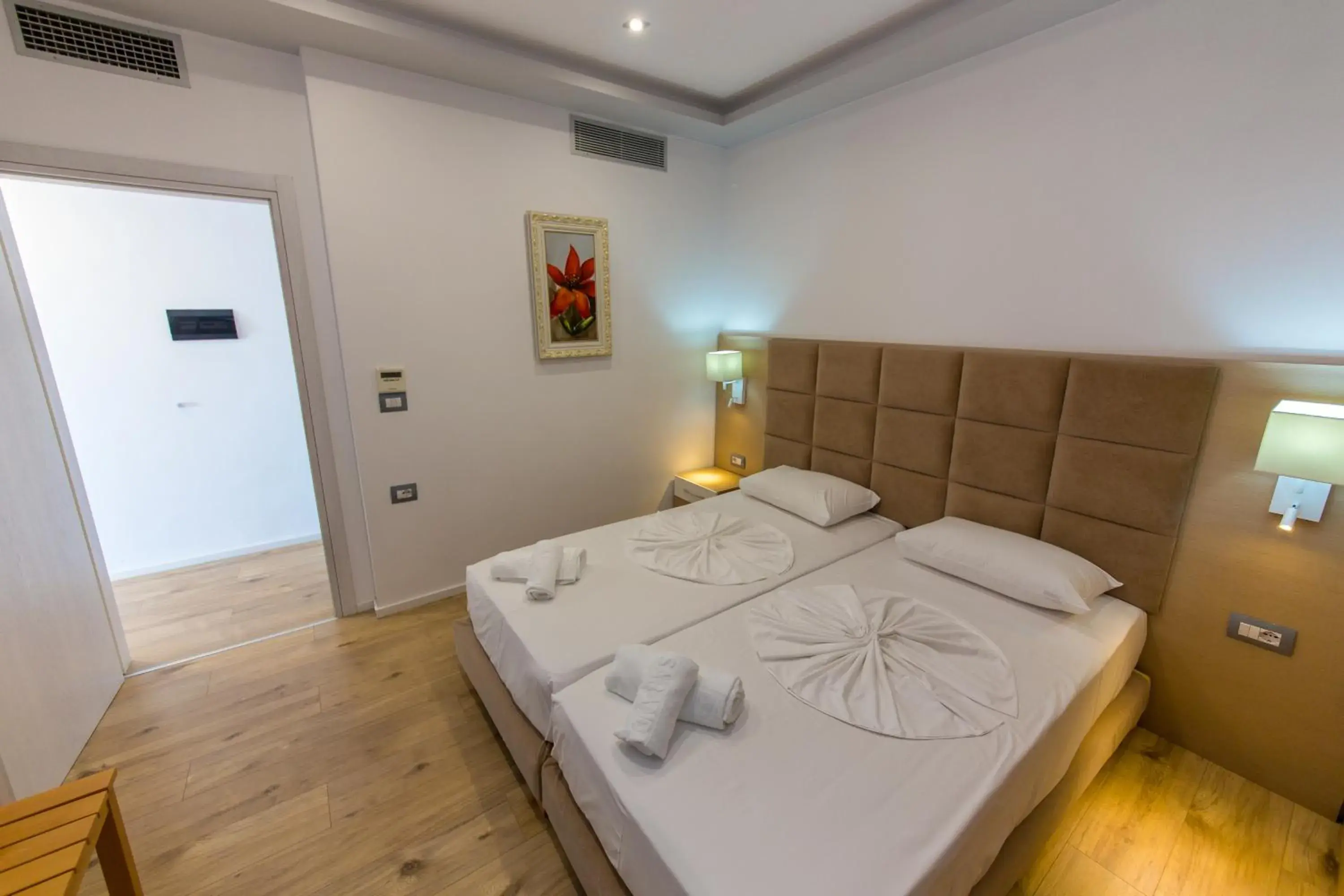 Two-Bedroom Family Room with Balcony and Sea View in Hotel Saranda Palace Two-Bedroom Family Room with Balcony and Sea View in Hotel Saranda Palace