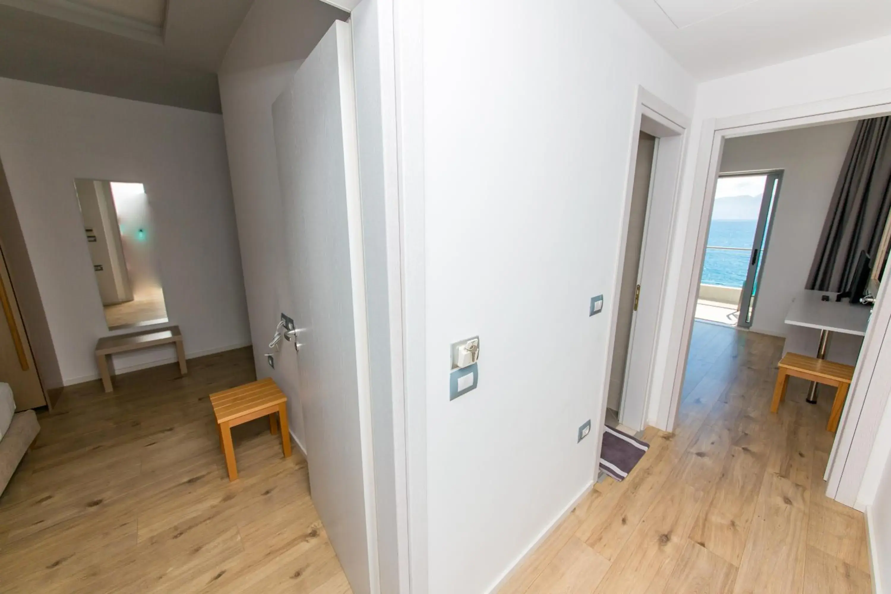 Two-Bedroom Family Room with Balcony and Sea View in Hotel Saranda Palace Two-Bedroom Family Room with Balcony and Sea View in Hotel Saranda Palace