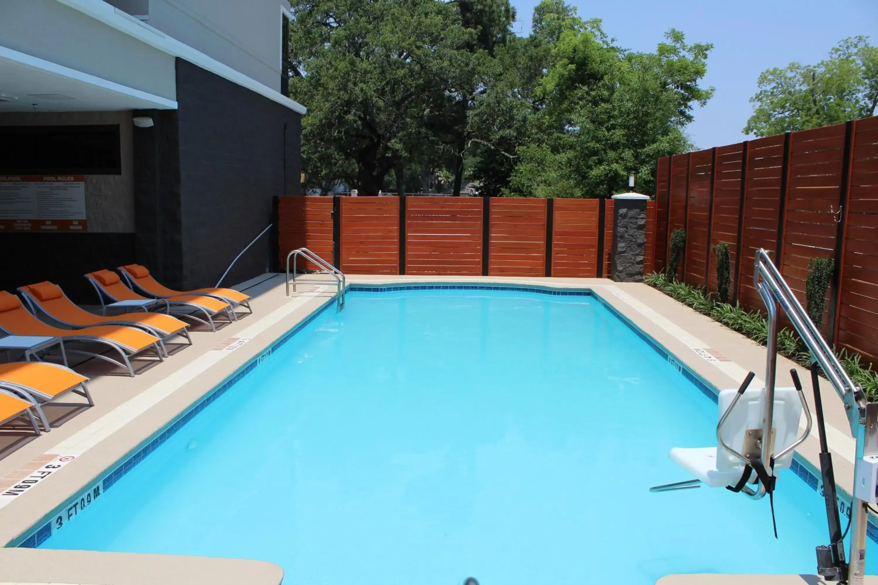 Swimming pool in Holiday Inn Pensacola - University Area by IHG Swimming pool in Holiday Inn Pensacola - University Area by IHG