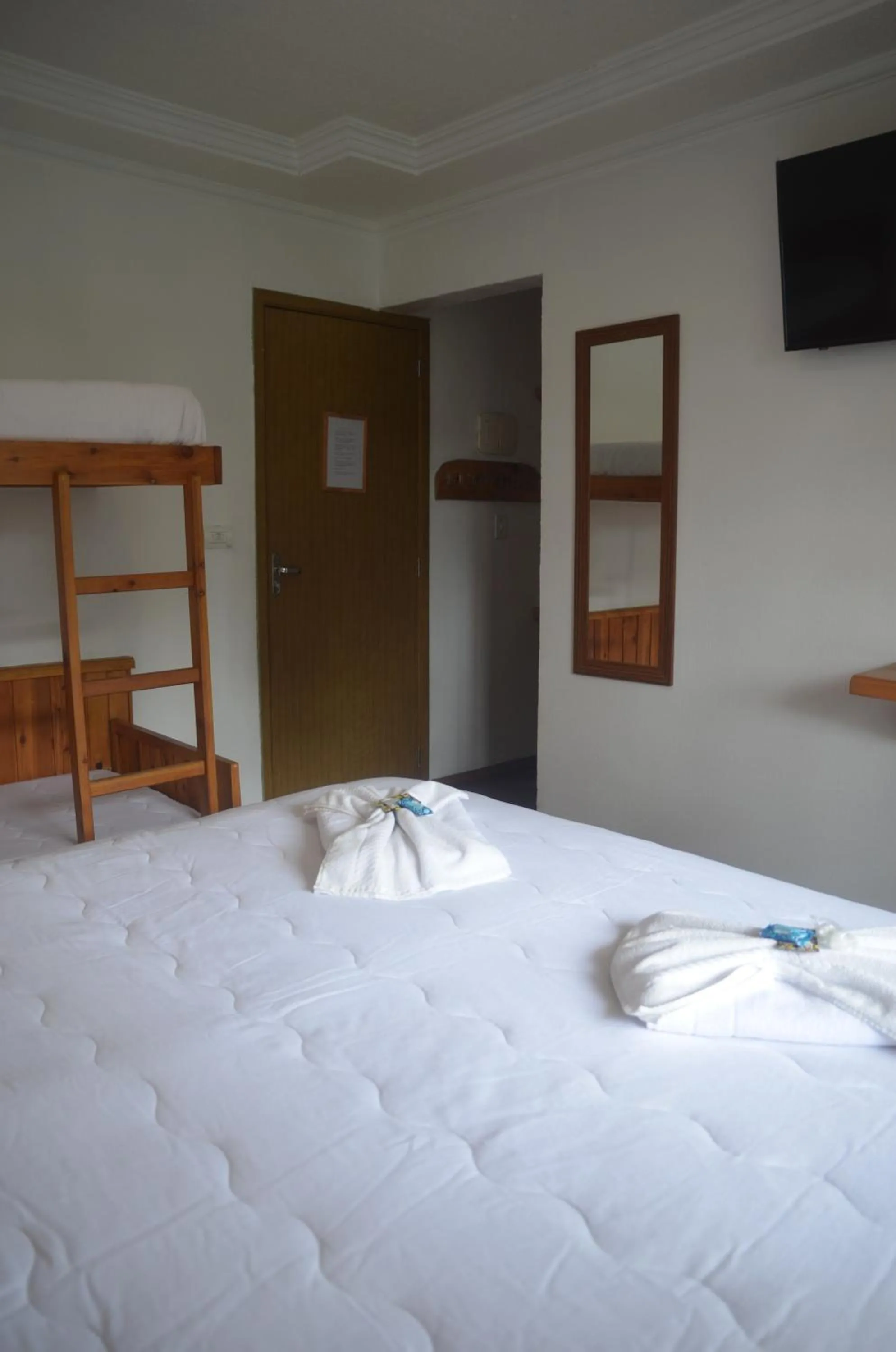 Bed in Pousada Primavera Campos do Jordao