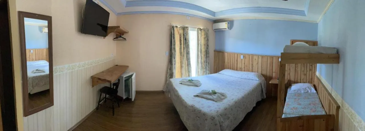 Bed in Pousada Primavera Campos do Jordao