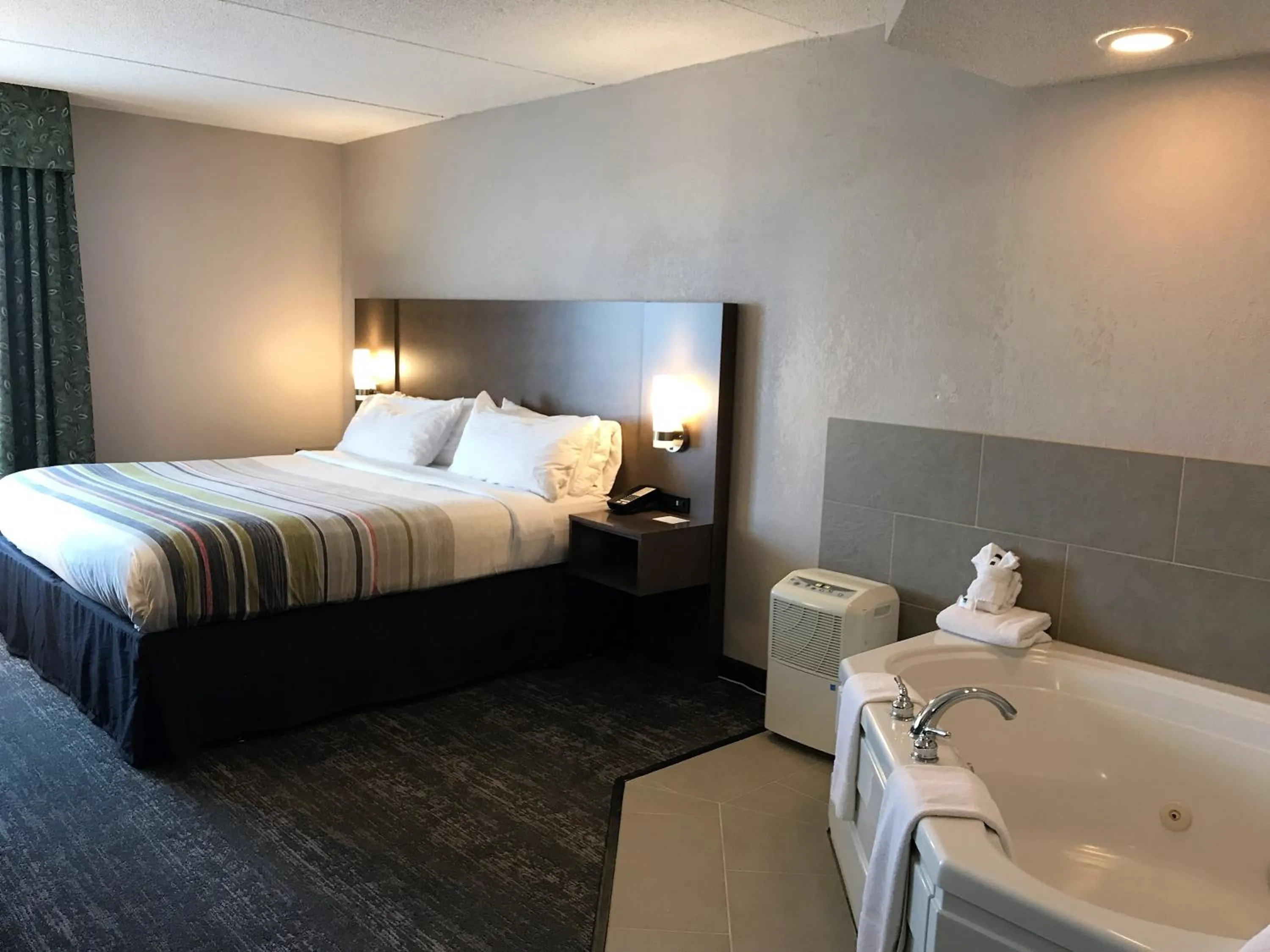 Bedroom, Bed in Country Inn & Suites by Radisson, Mt Pleasant-Racine West, WI