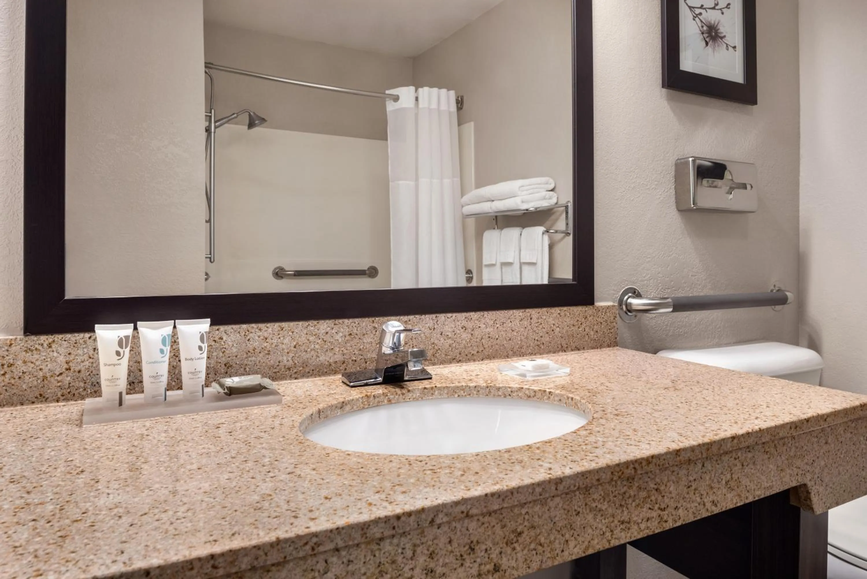 Bathroom in Country Inn & Suites by Radisson, Mt Pleasant-Racine West, WI